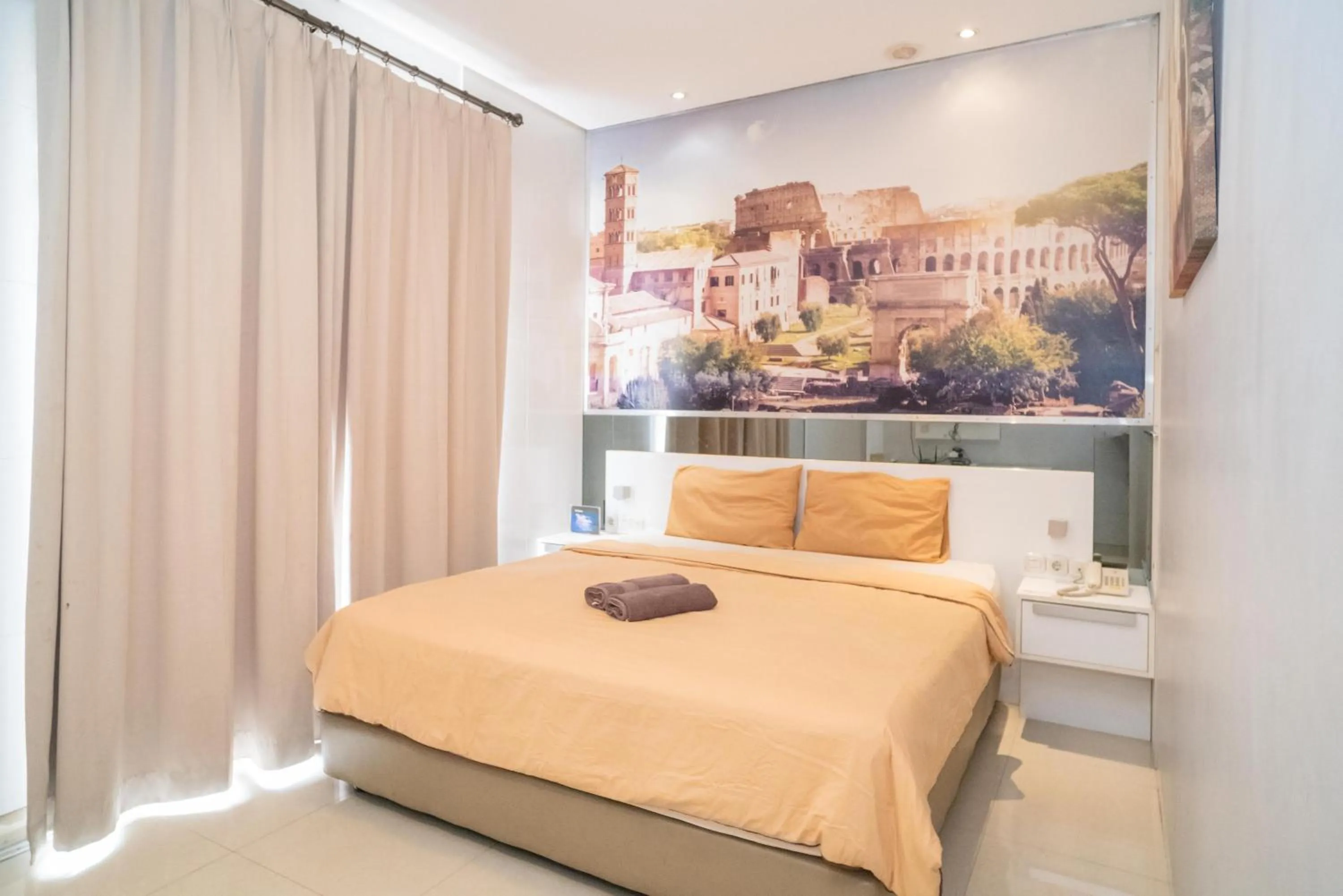 Bed in RedDoorz at Tirta Mansion Paramount Gading