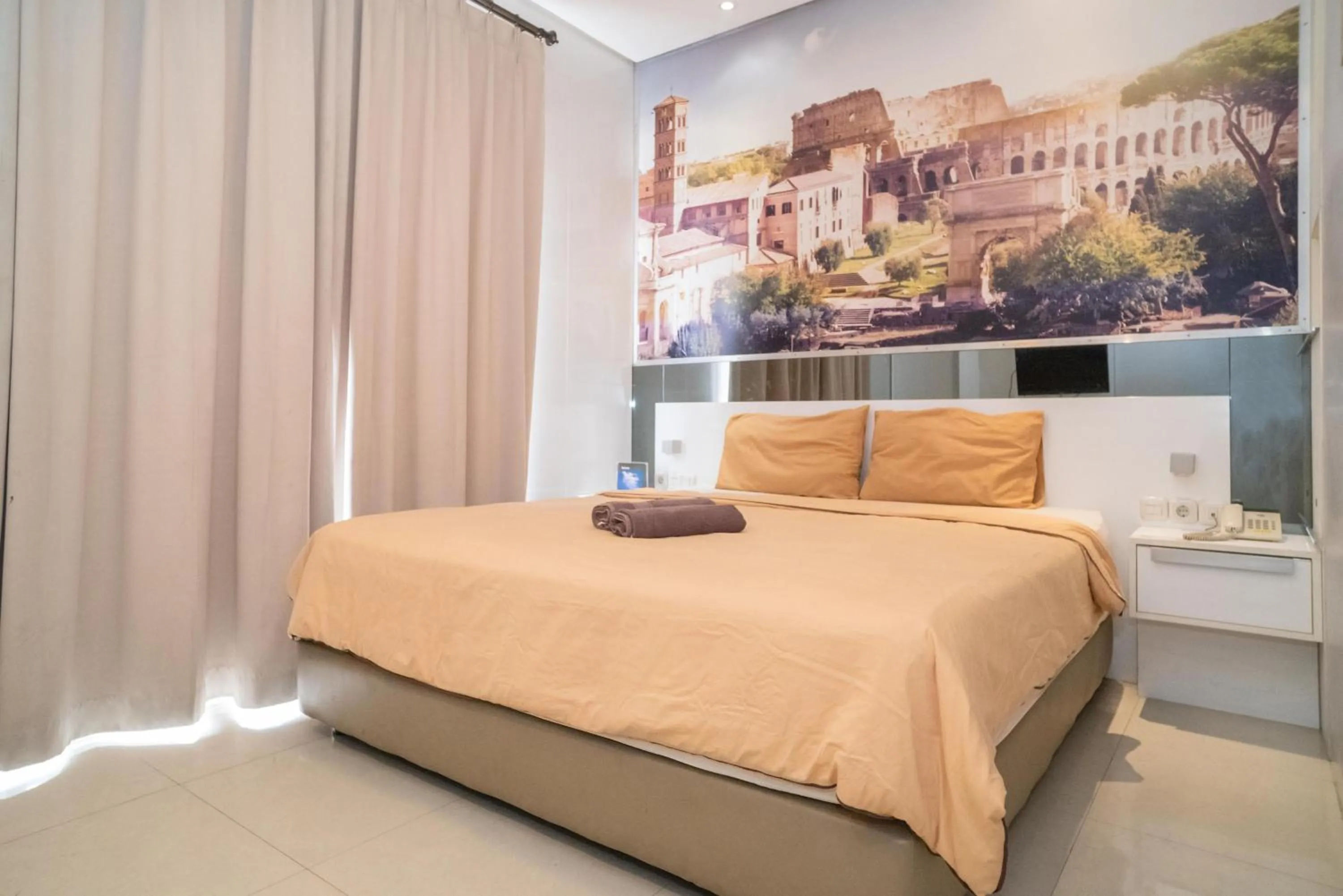 Photo of the whole room, Bed in RedDoorz at Tirta Mansion Paramount Gading