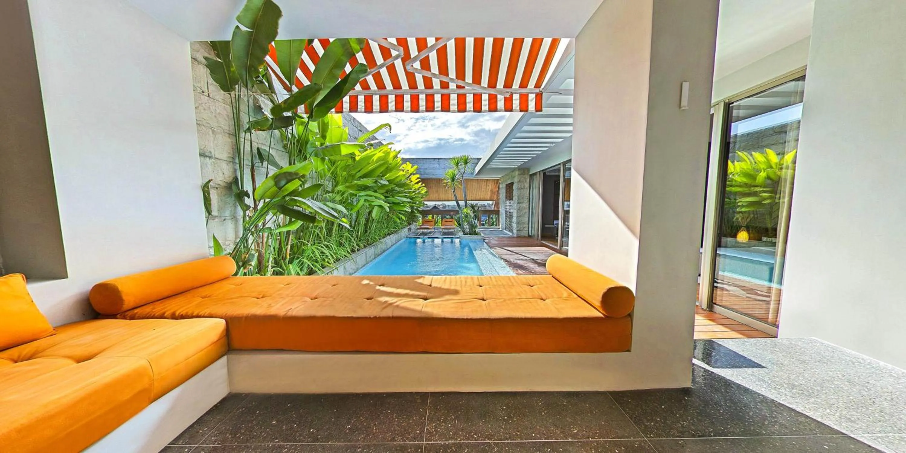 Pool view in TS SUITES Seminyak Bali