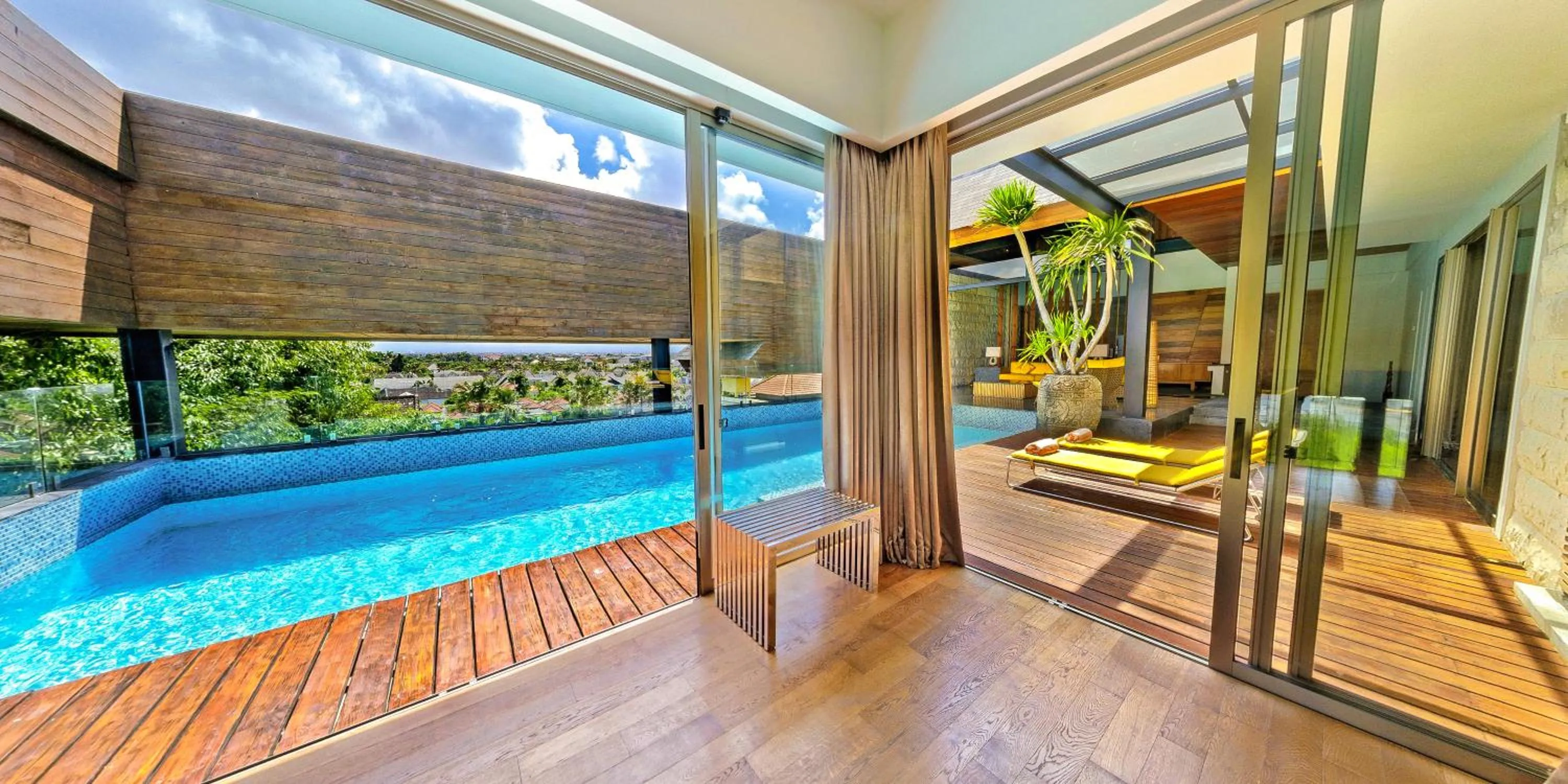 Pool view in TS SUITES Seminyak Bali