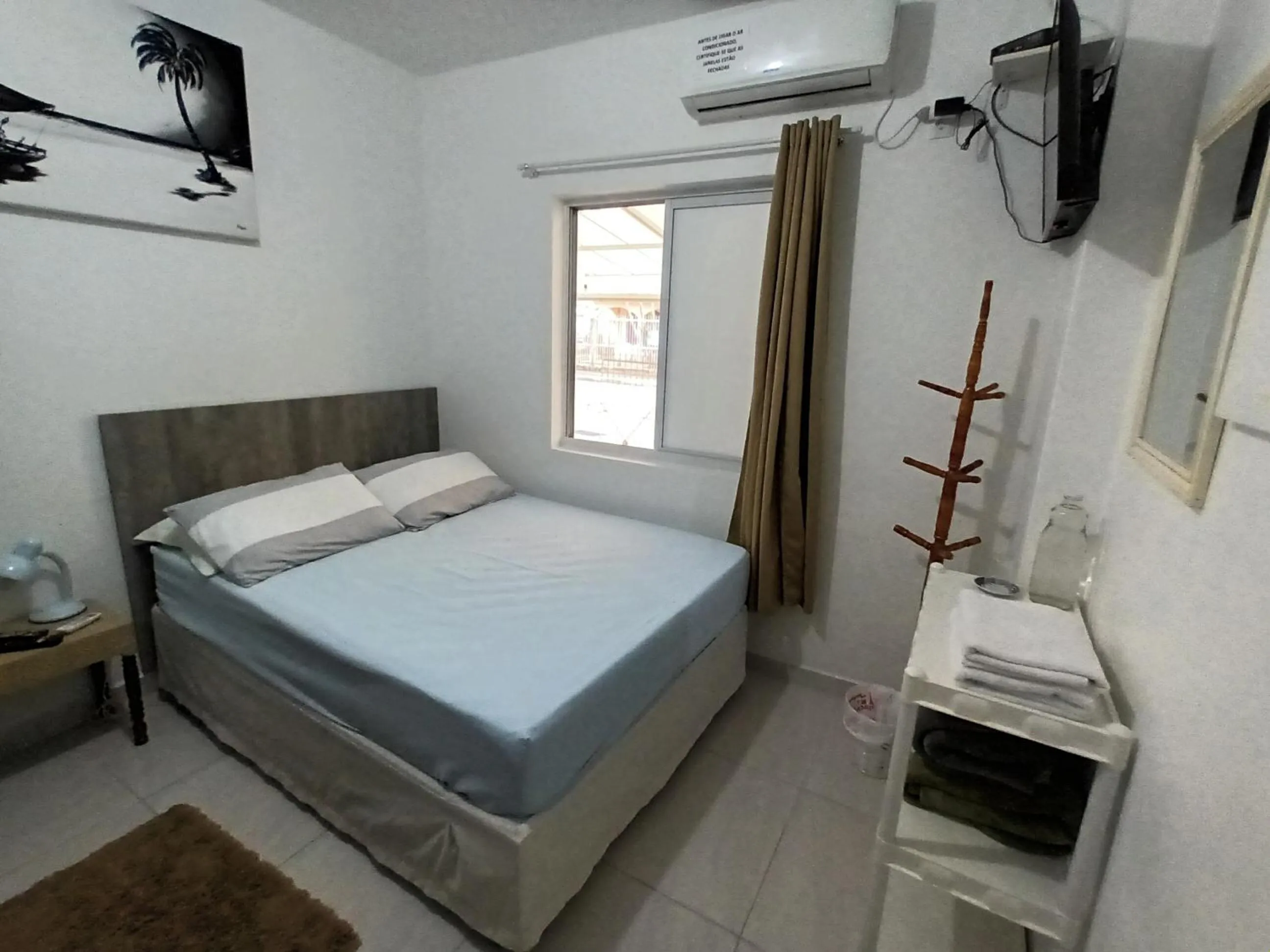 Bed in Pousada Executiva SolRiso Aeroporto Florianópolis