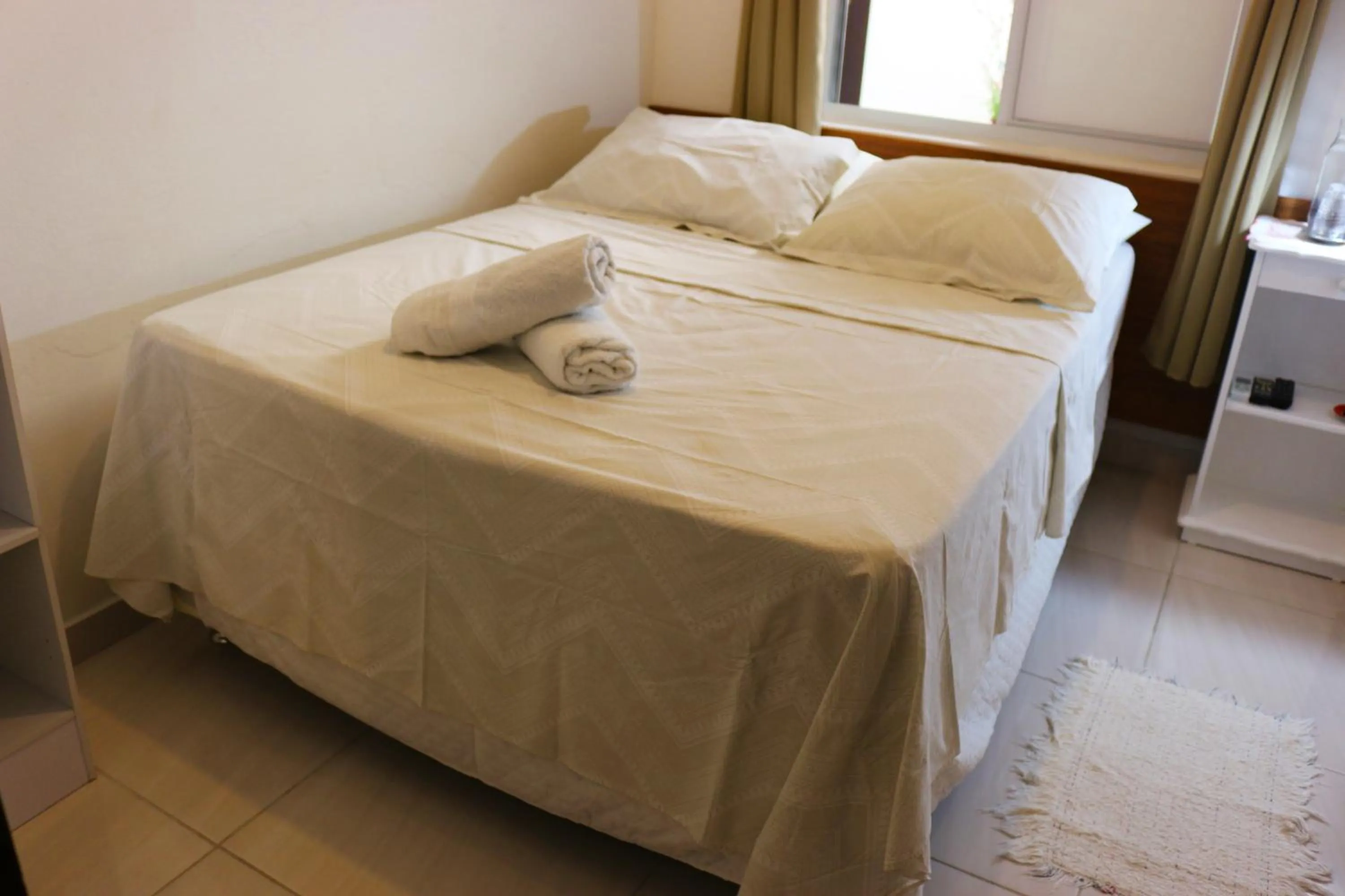 Bed in Pousada Executiva SolRiso Aeroporto Florianópolis