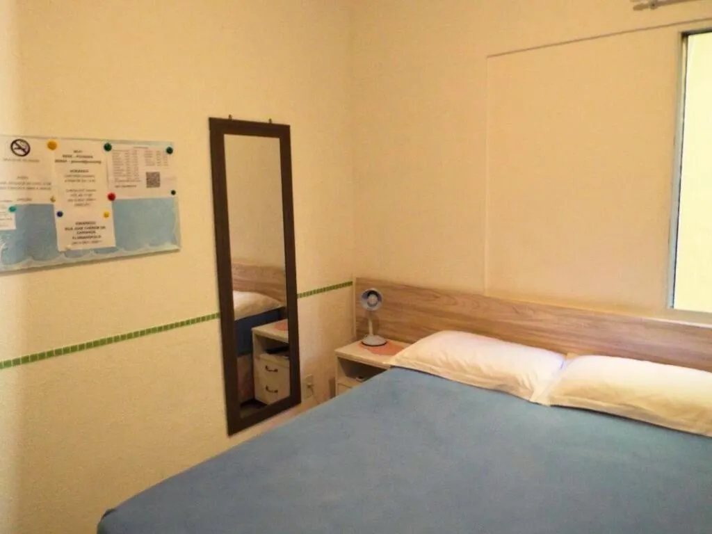 Bed in Pousada Executiva SolRiso Aeroporto Florianópolis