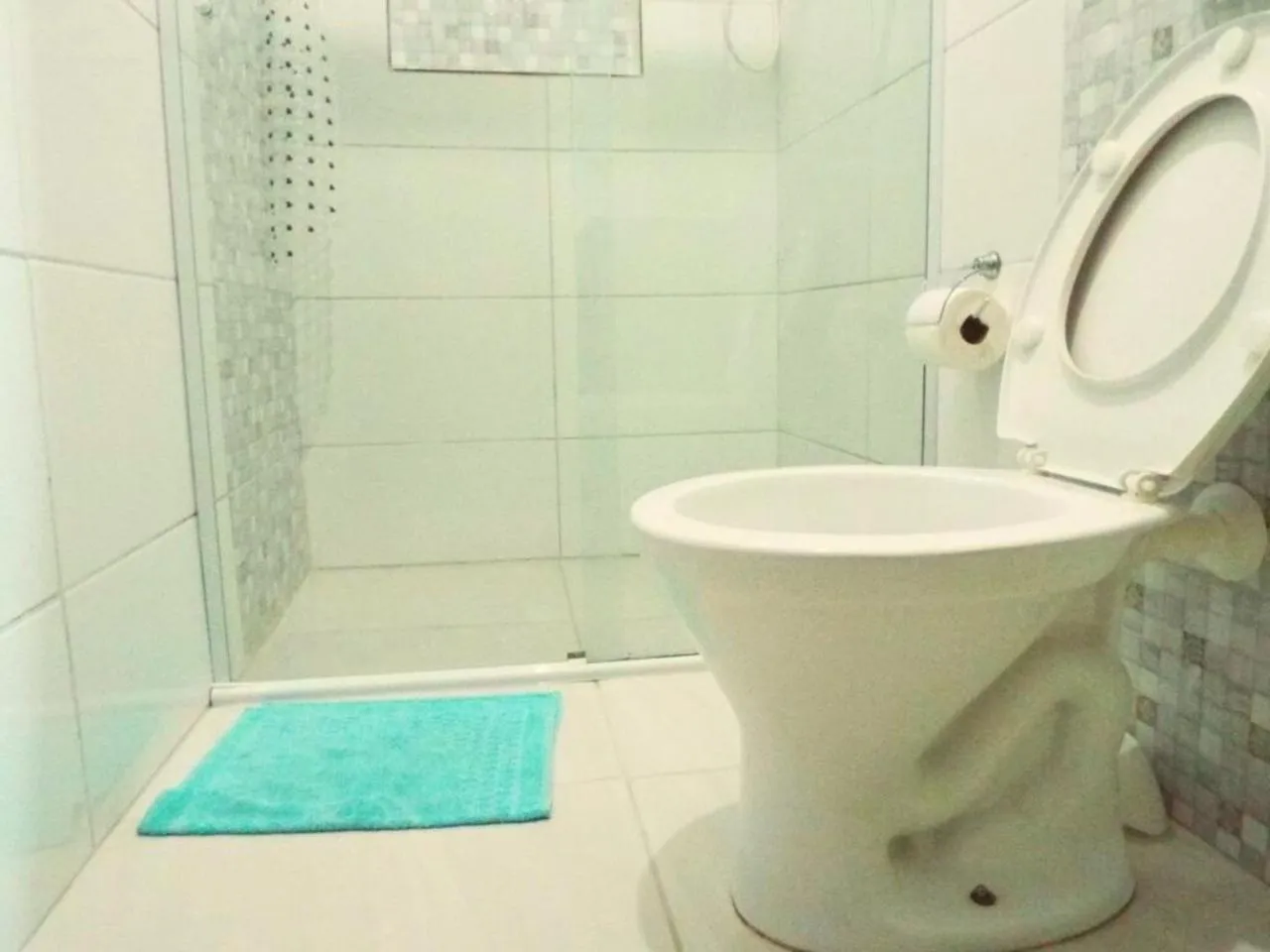 Shower in Pousada Executiva SolRiso Aeroporto Florianópolis