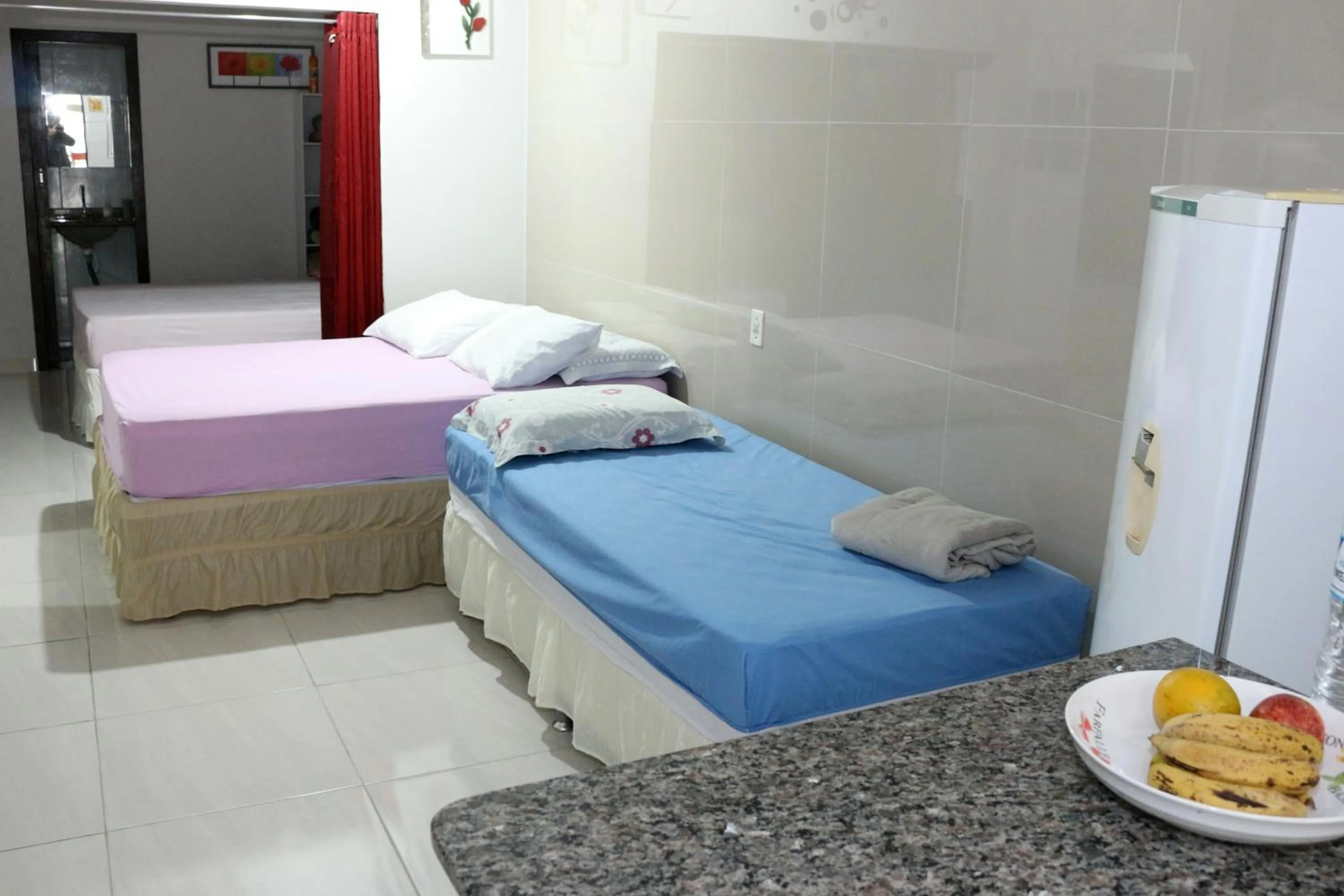 Bed in Pousada Executiva SolRiso Aeroporto Florianópolis