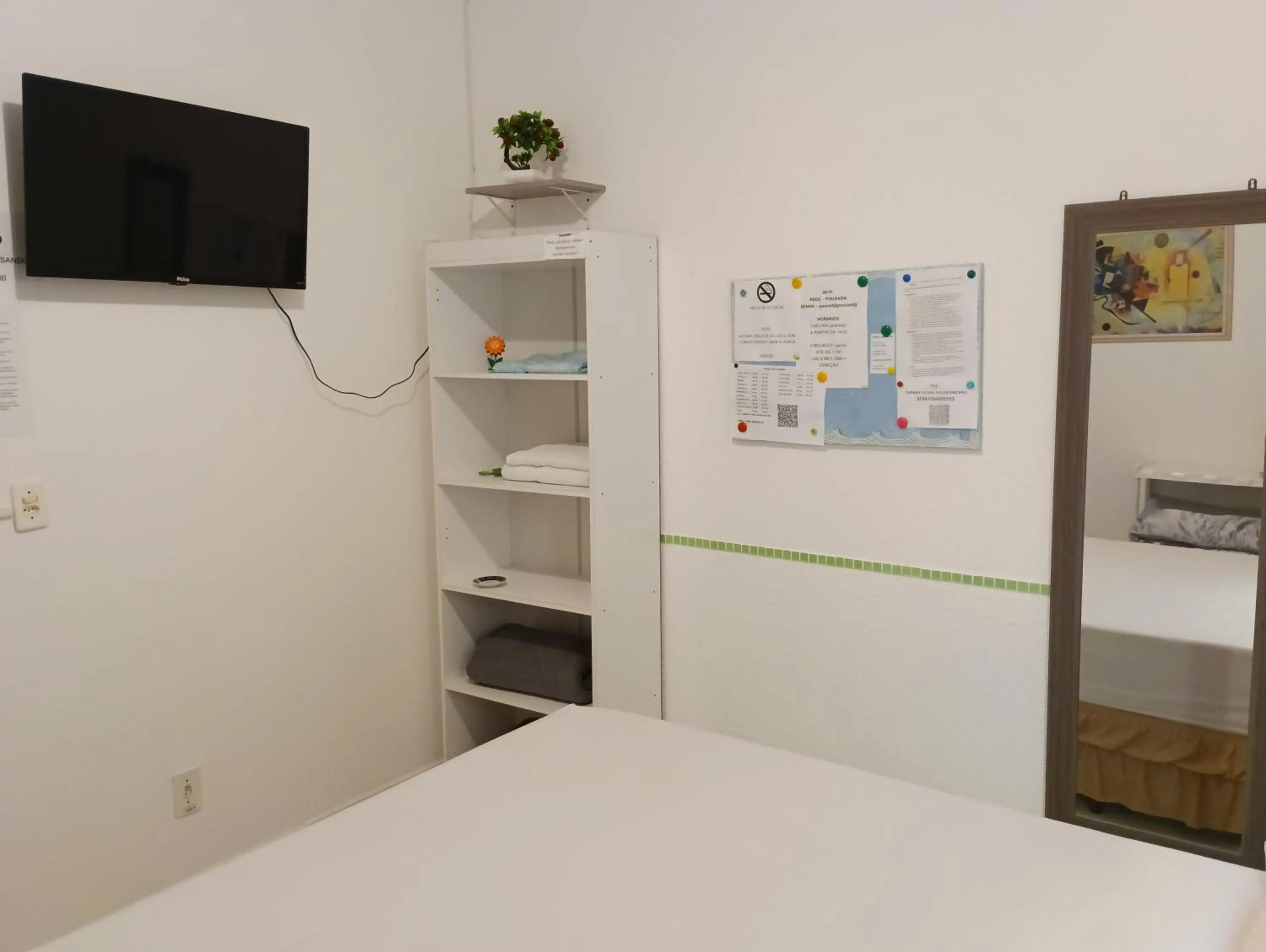 Bed in Pousada Executiva SolRiso Aeroporto Florianópolis