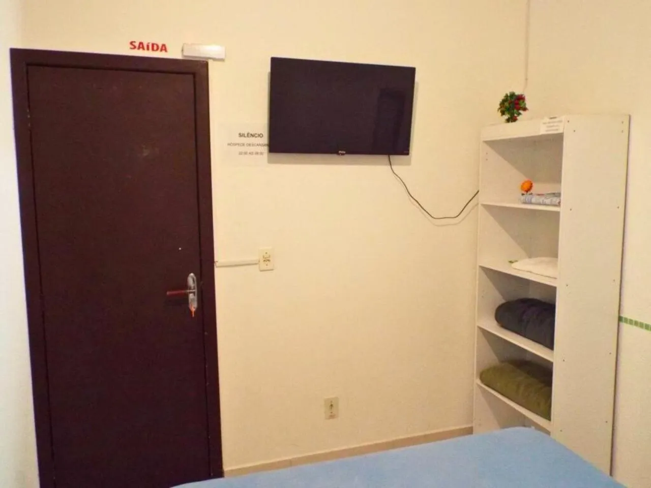 Communal lounge/ TV room, Bed in Pousada Executiva SolRiso Aeroporto Florianópolis