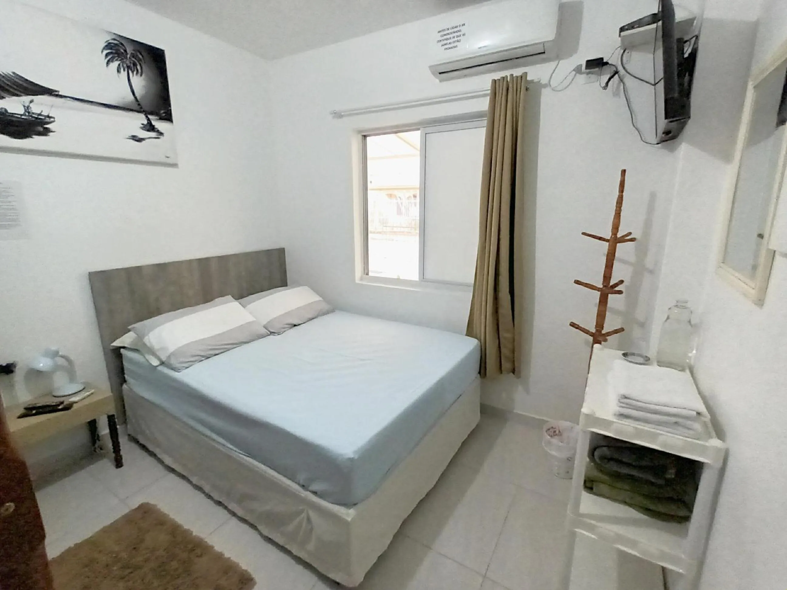 Bed in Pousada Executiva SolRiso Aeroporto Florianópolis