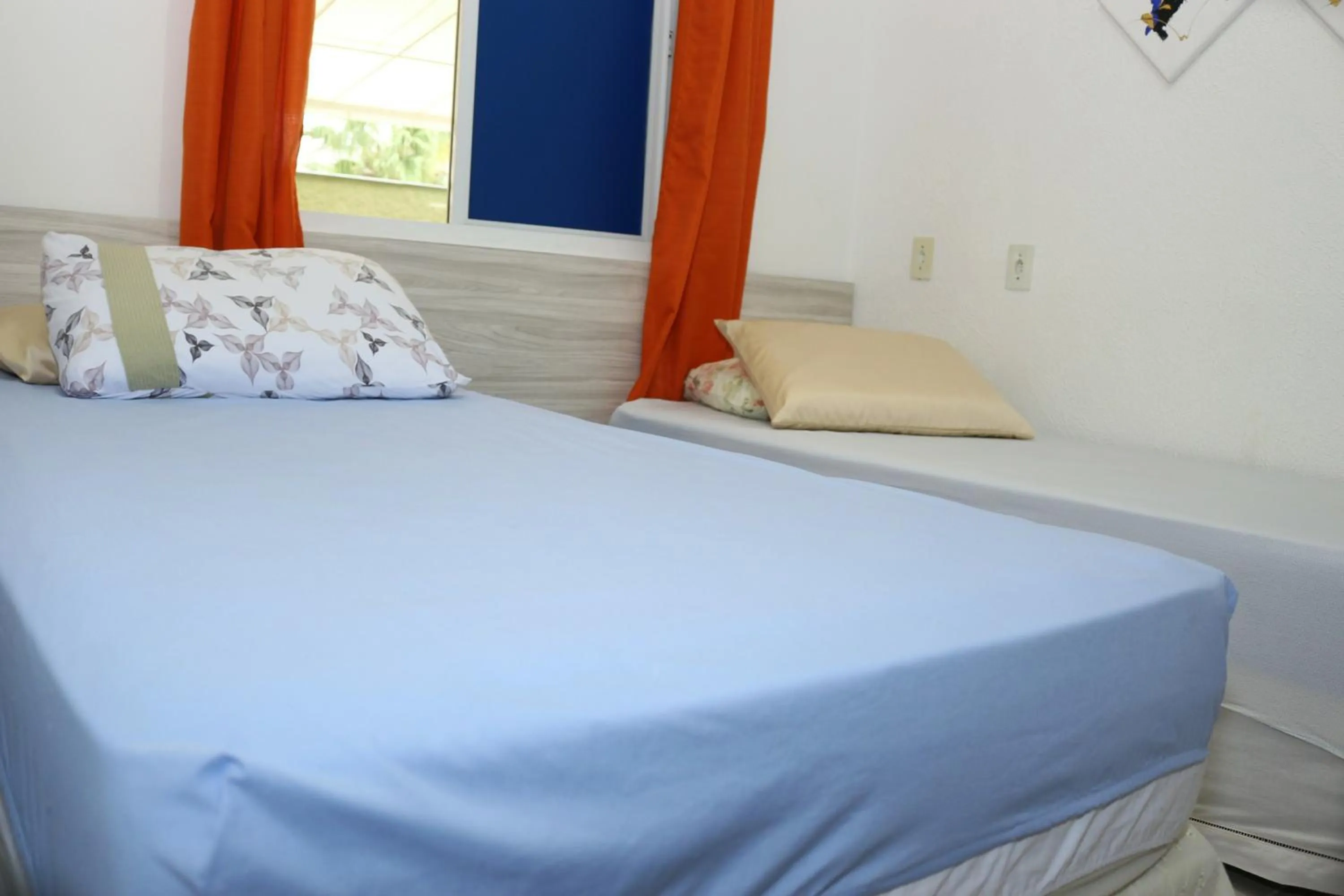 Bed in Pousada Executiva SolRiso Aeroporto Florianópolis