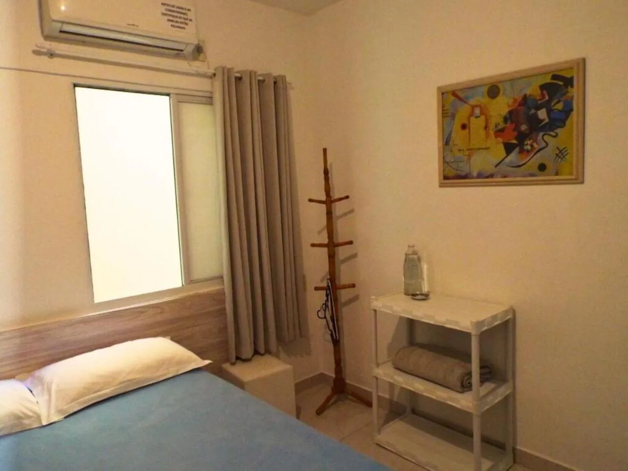 Bed in Pousada Executiva SolRiso Aeroporto Florianópolis