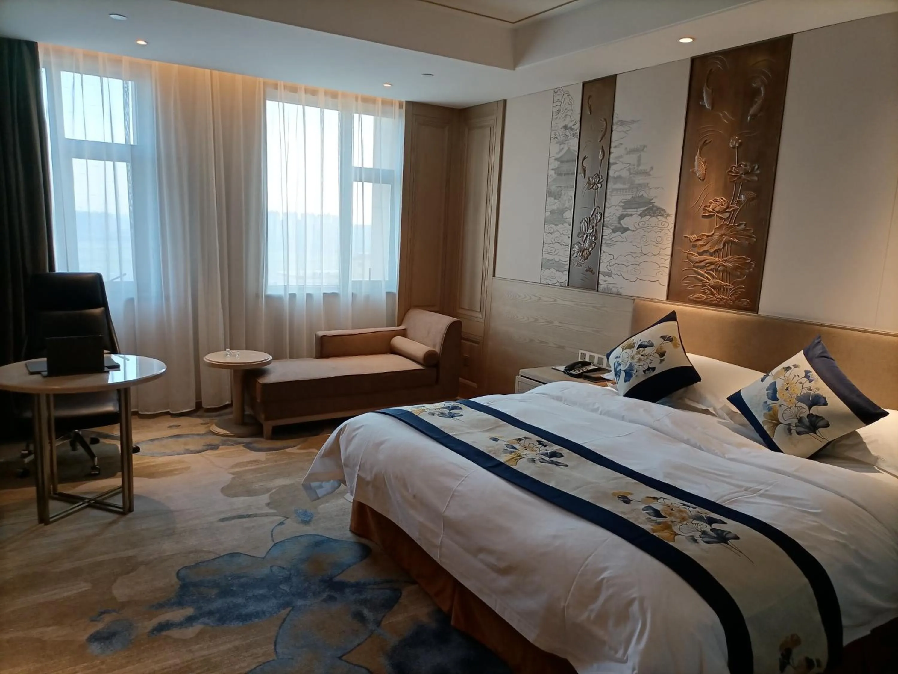 Bed in Baoying Jinling Hotel