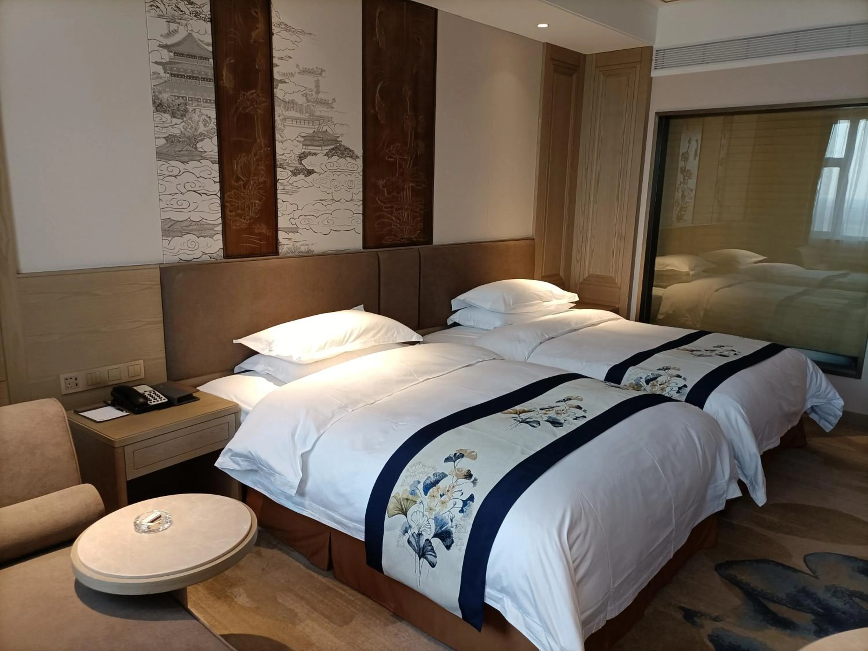 Bed in Baoying Jinling Hotel
