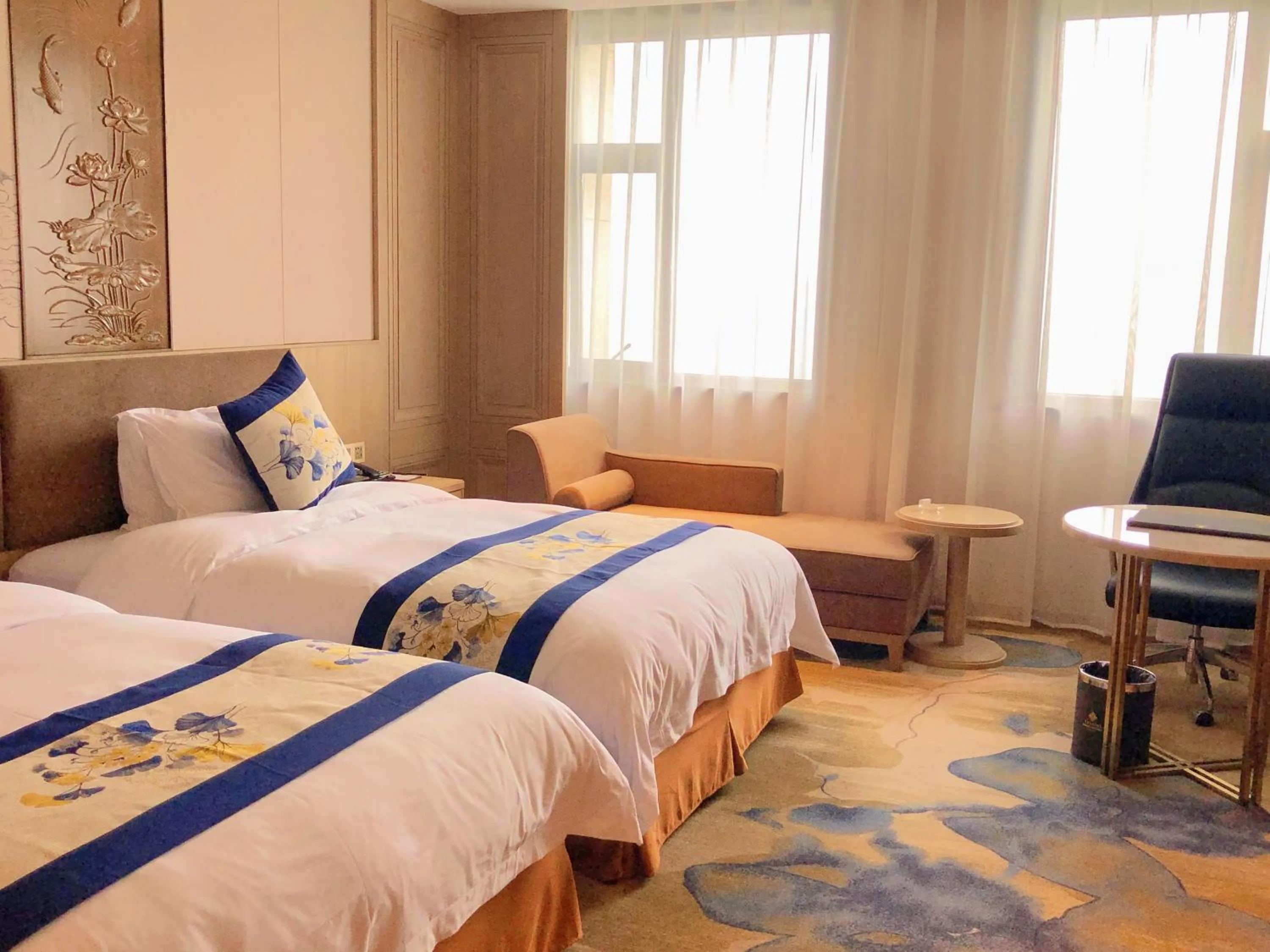 Bed in Baoying Jinling Hotel