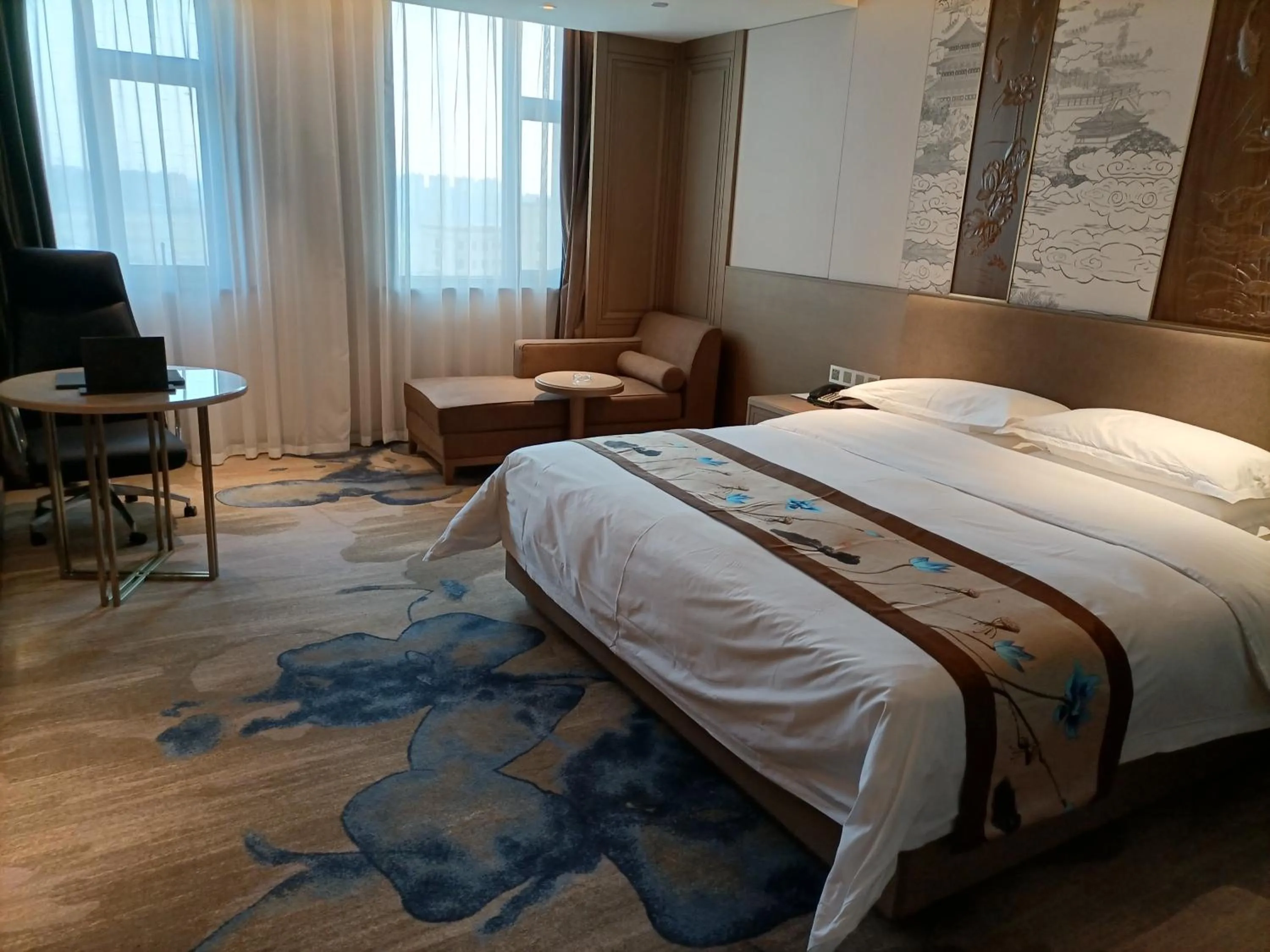 Bed in Baoying Jinling Hotel