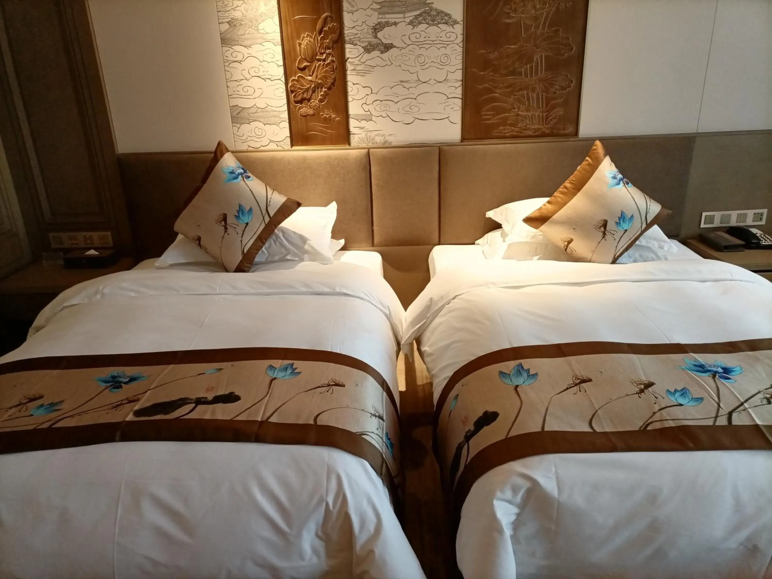 Bed in Baoying Jinling Hotel