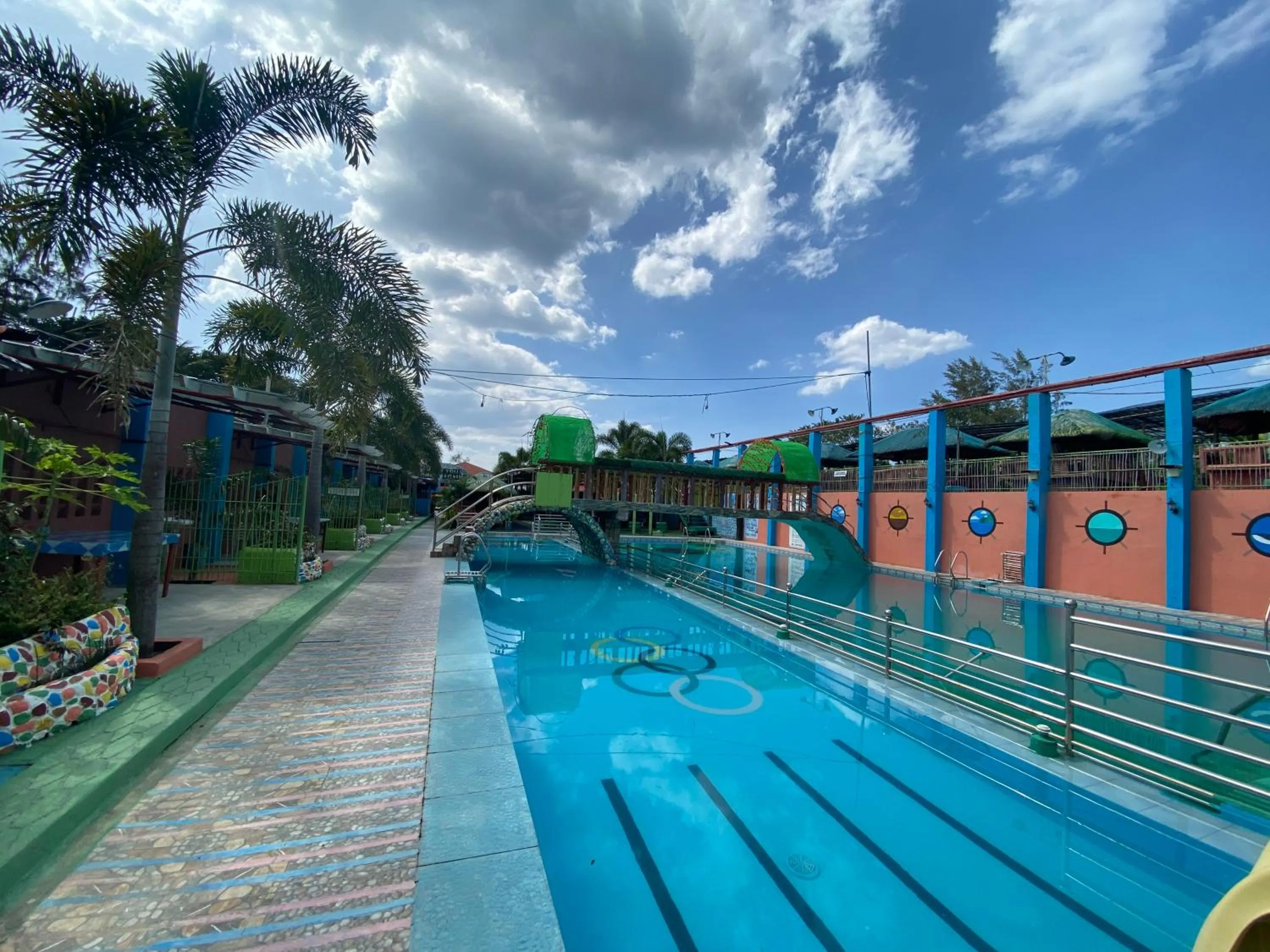 Swimming pool in RedDoorz Plus @ Lhexlyn Resort San Narciso