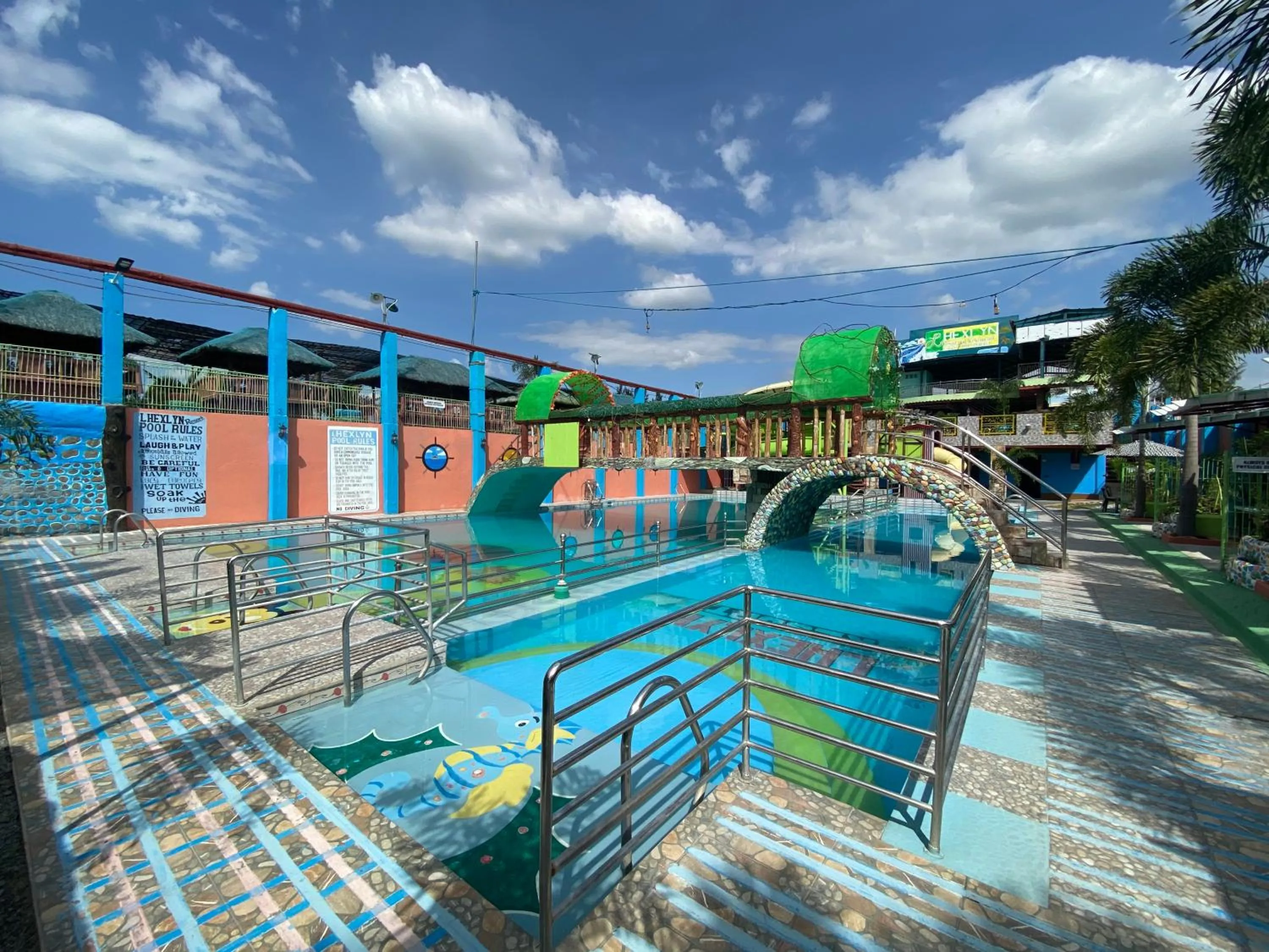 Swimming pool in RedDoorz Plus @ Lhexlyn Resort San Narciso