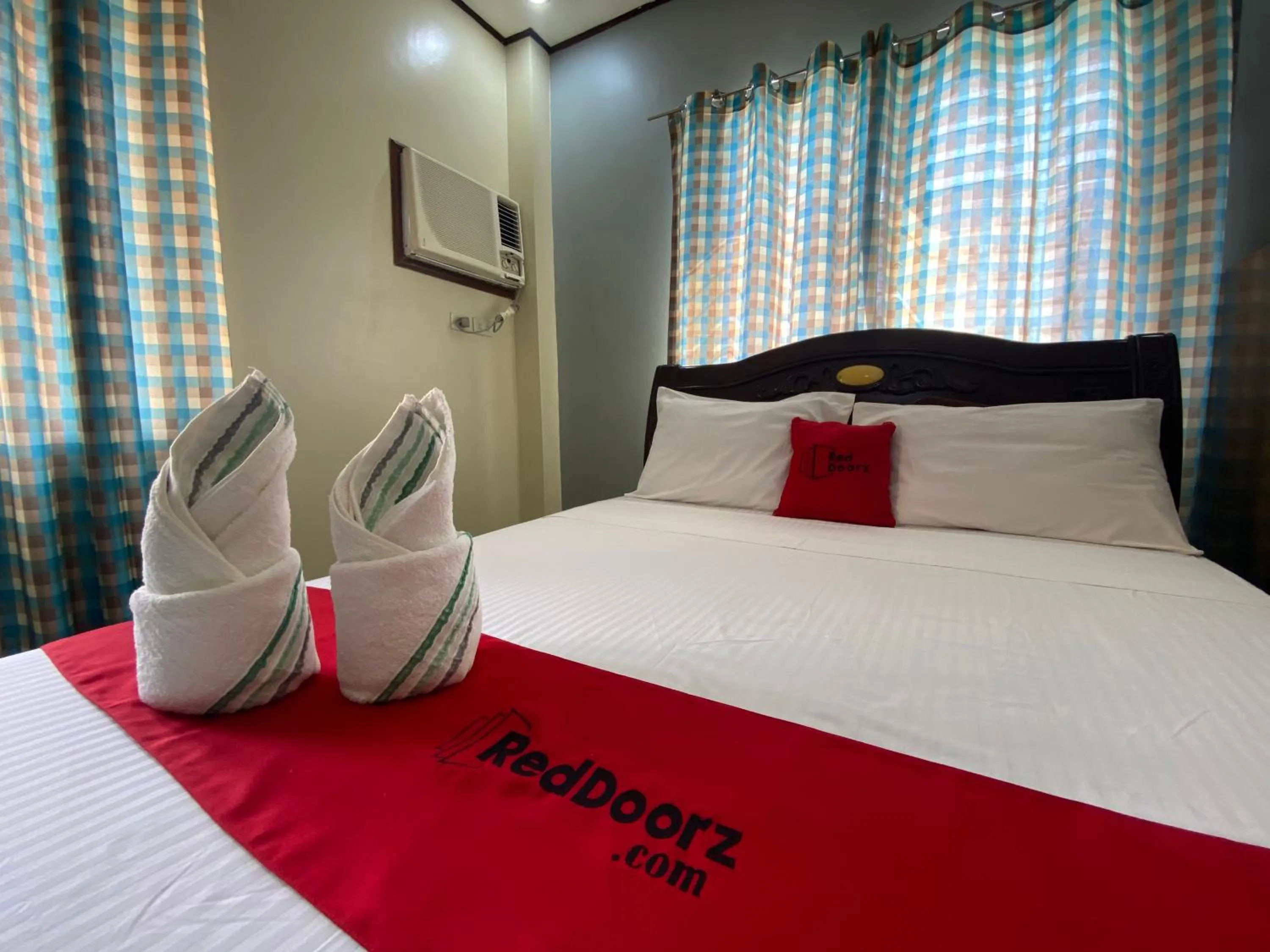 Photo of the whole room in RedDoorz Plus @ Lhexlyn Resort San Narciso