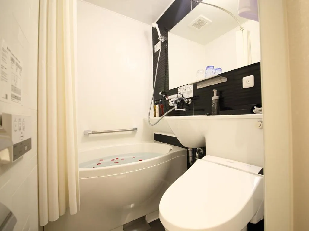 Bathroom in Dynasty Hotel & Resort Osaka