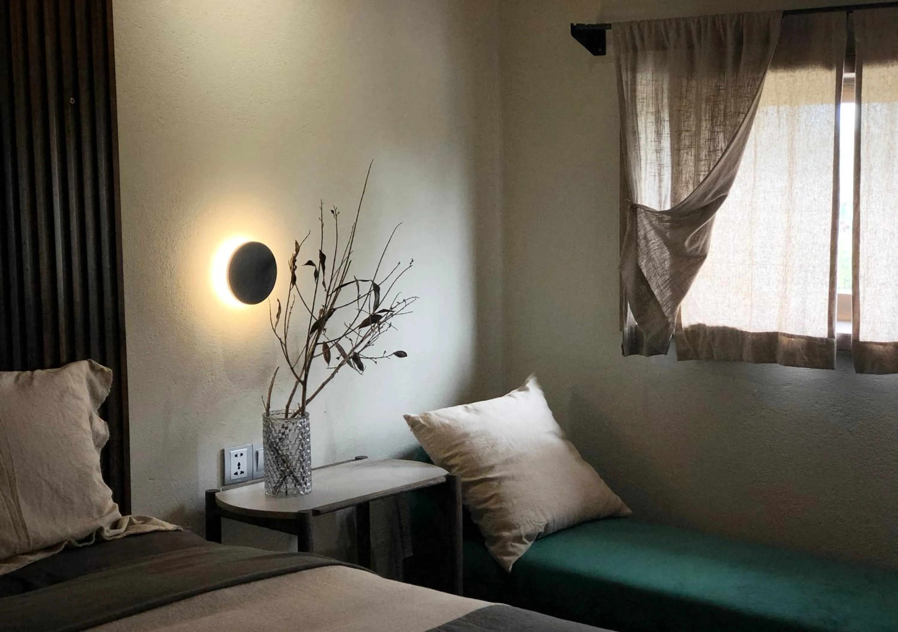 Bed in Kaia Gallery Hotel Hoi An