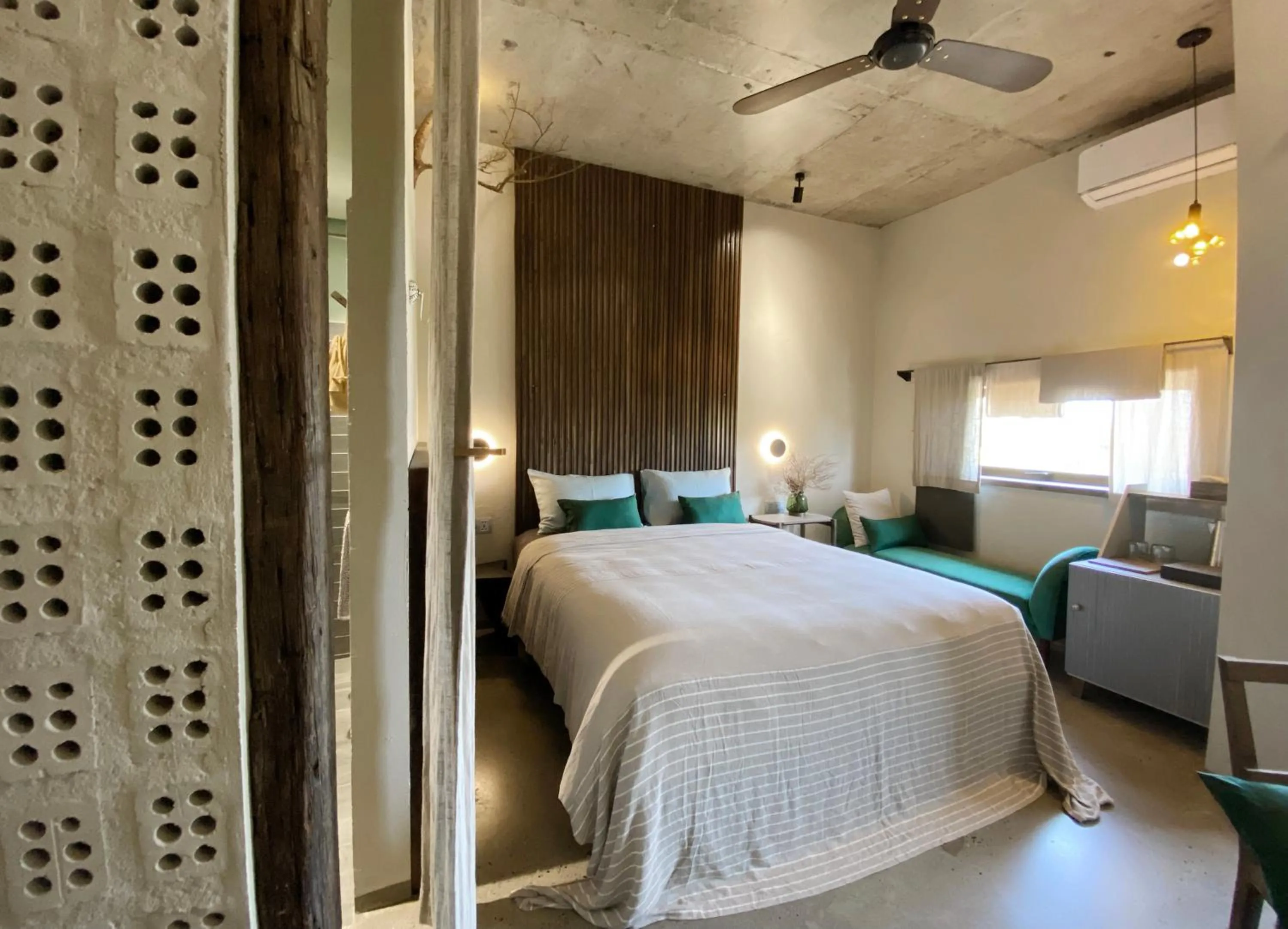 Bed in Kaia Gallery Hotel Hoi An