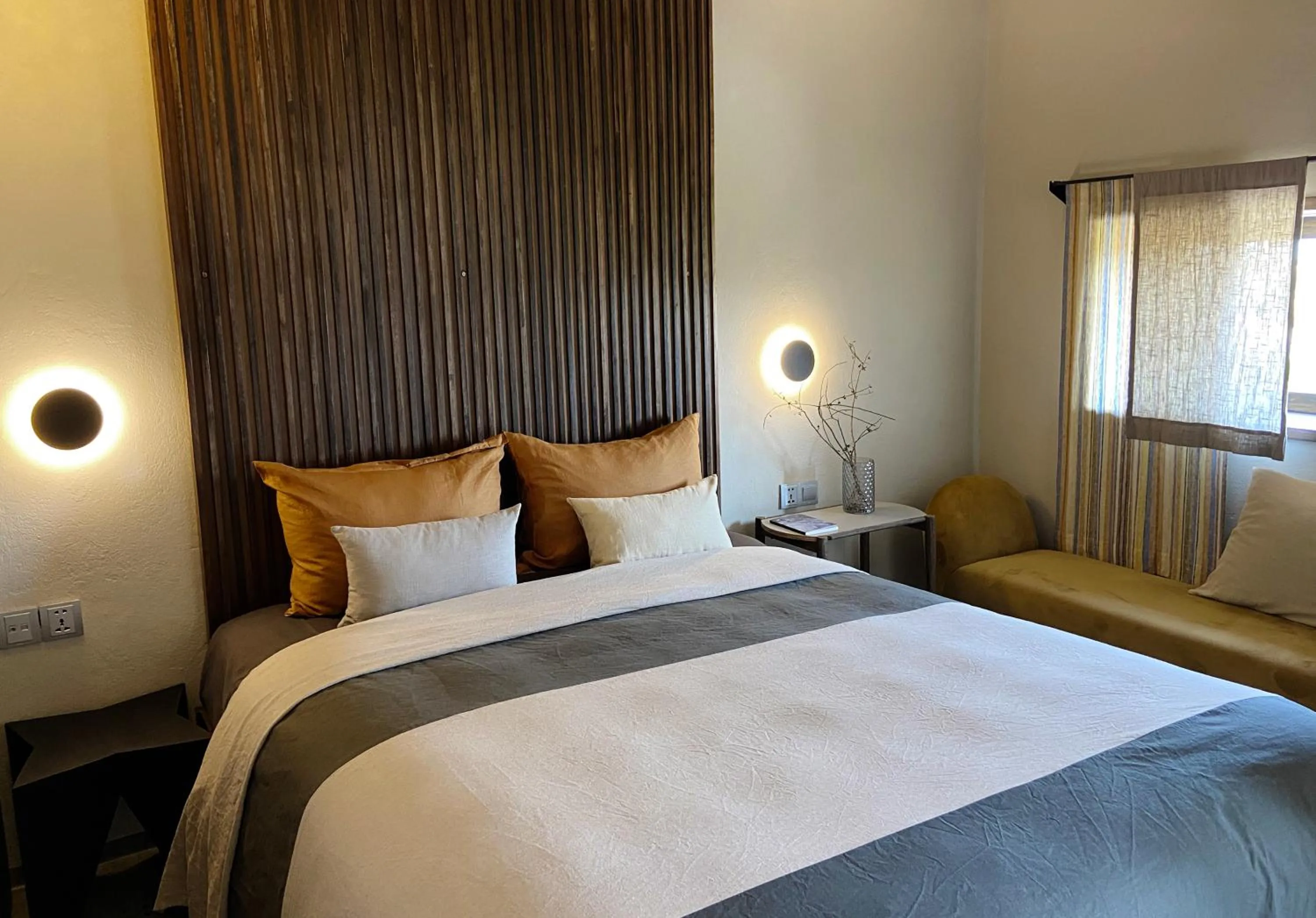 Bed in Kaia Gallery Hotel Hoi An