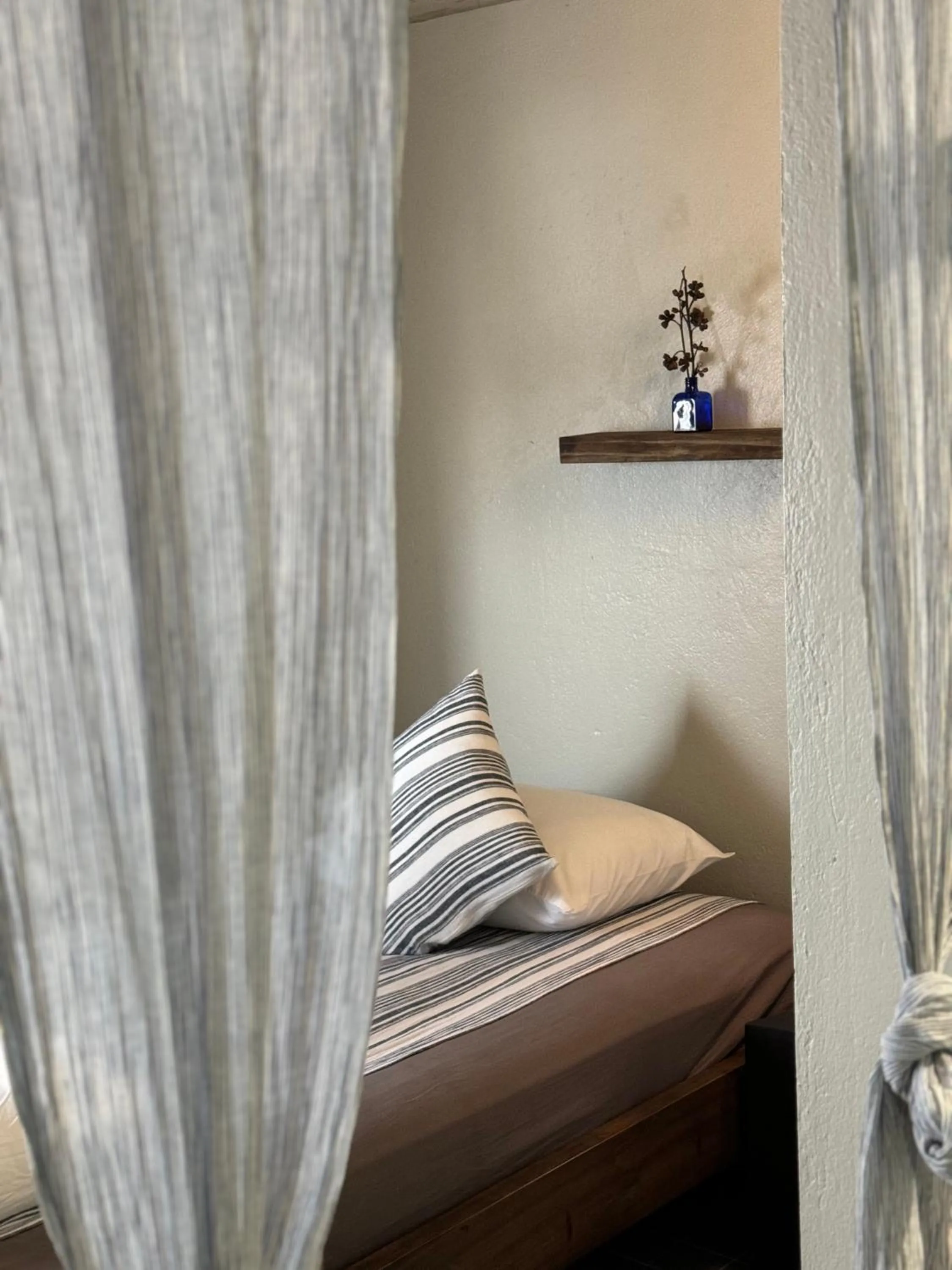 Bed in Kaia Gallery Hotel Hoi An