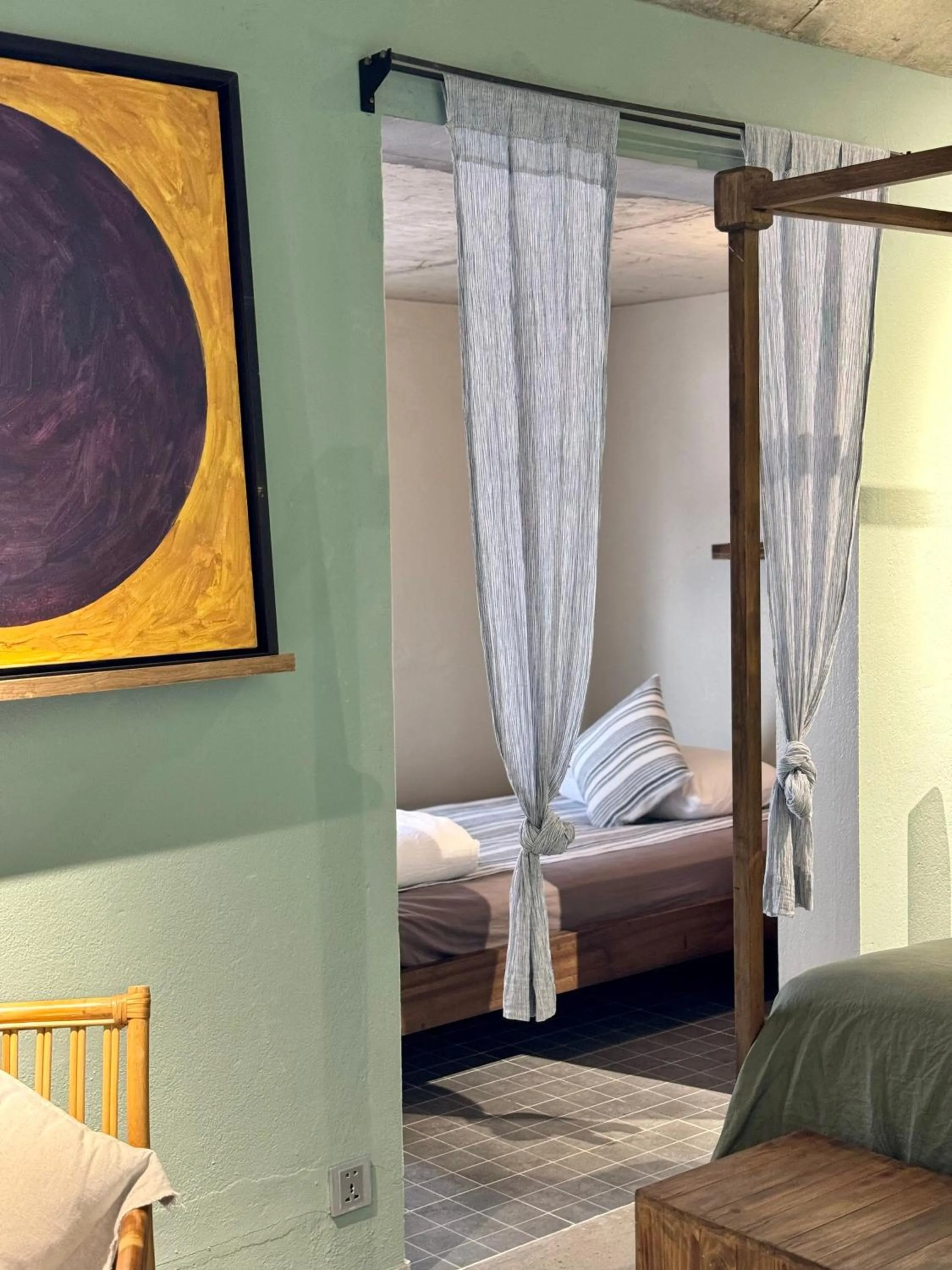 Bed in Kaia Gallery Hotel Hoi An