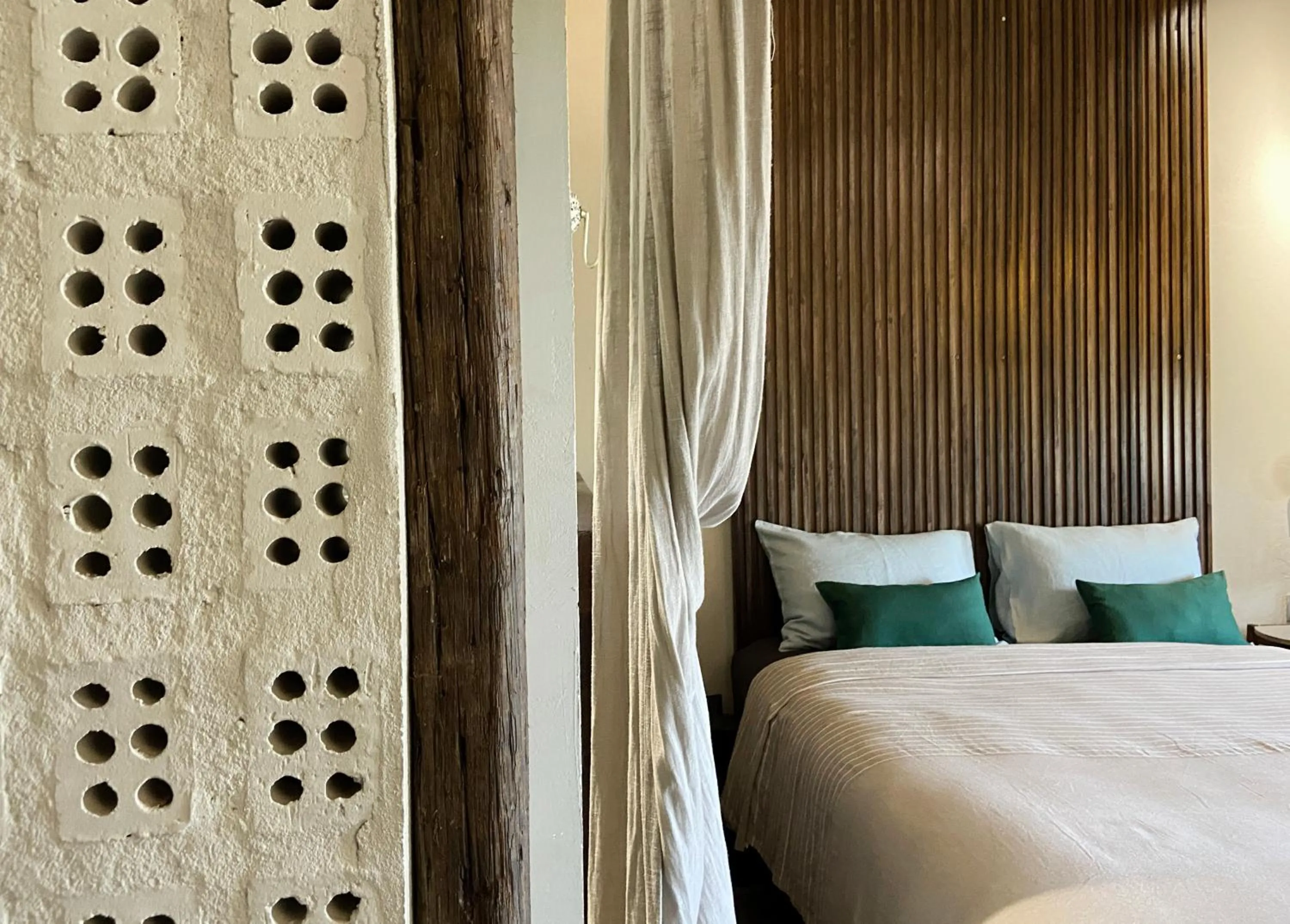 Bed in Kaia Gallery Hotel Hoi An