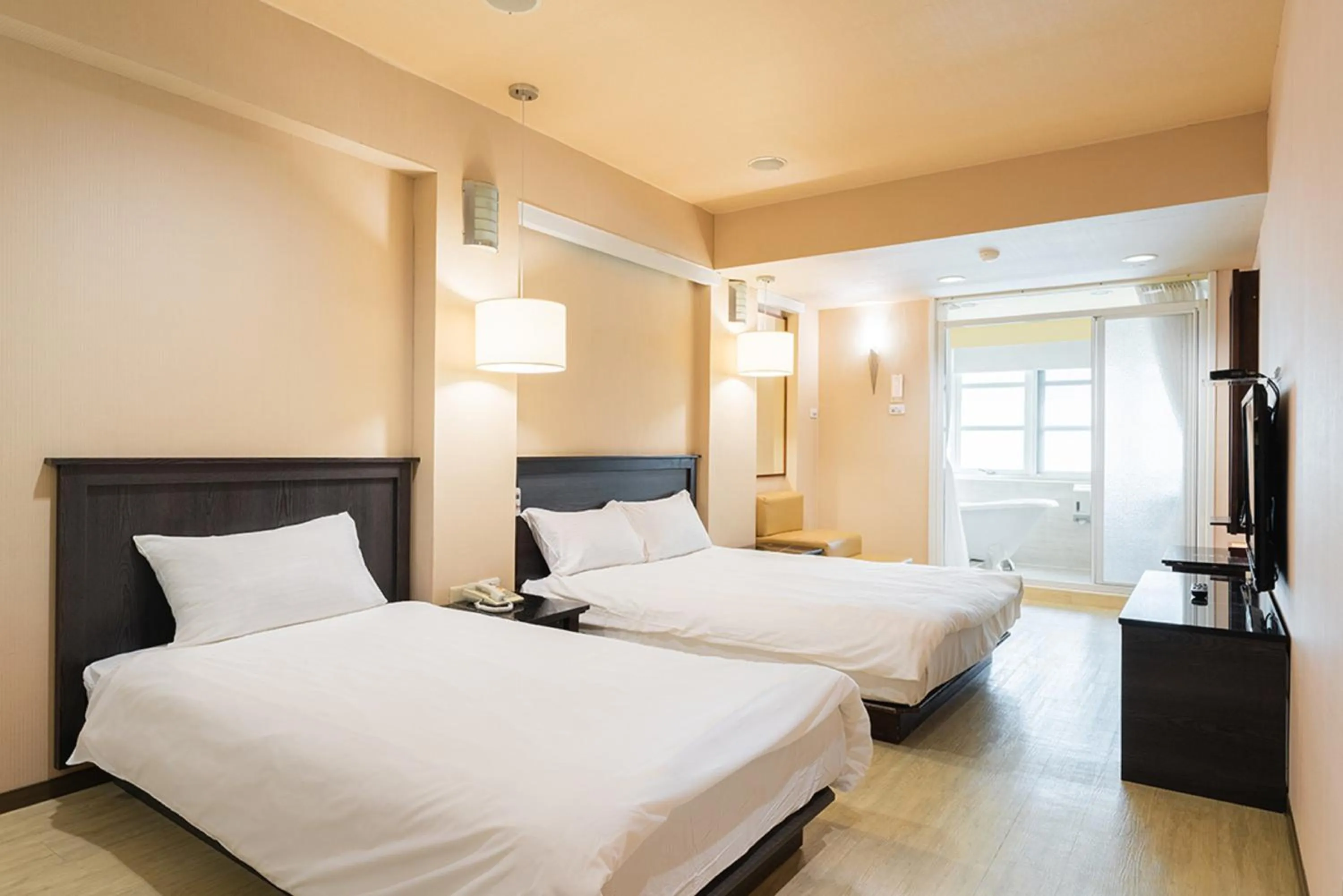 Photo of the whole room, Bed in Guide Hotel Kaohsiung Shinkuchan