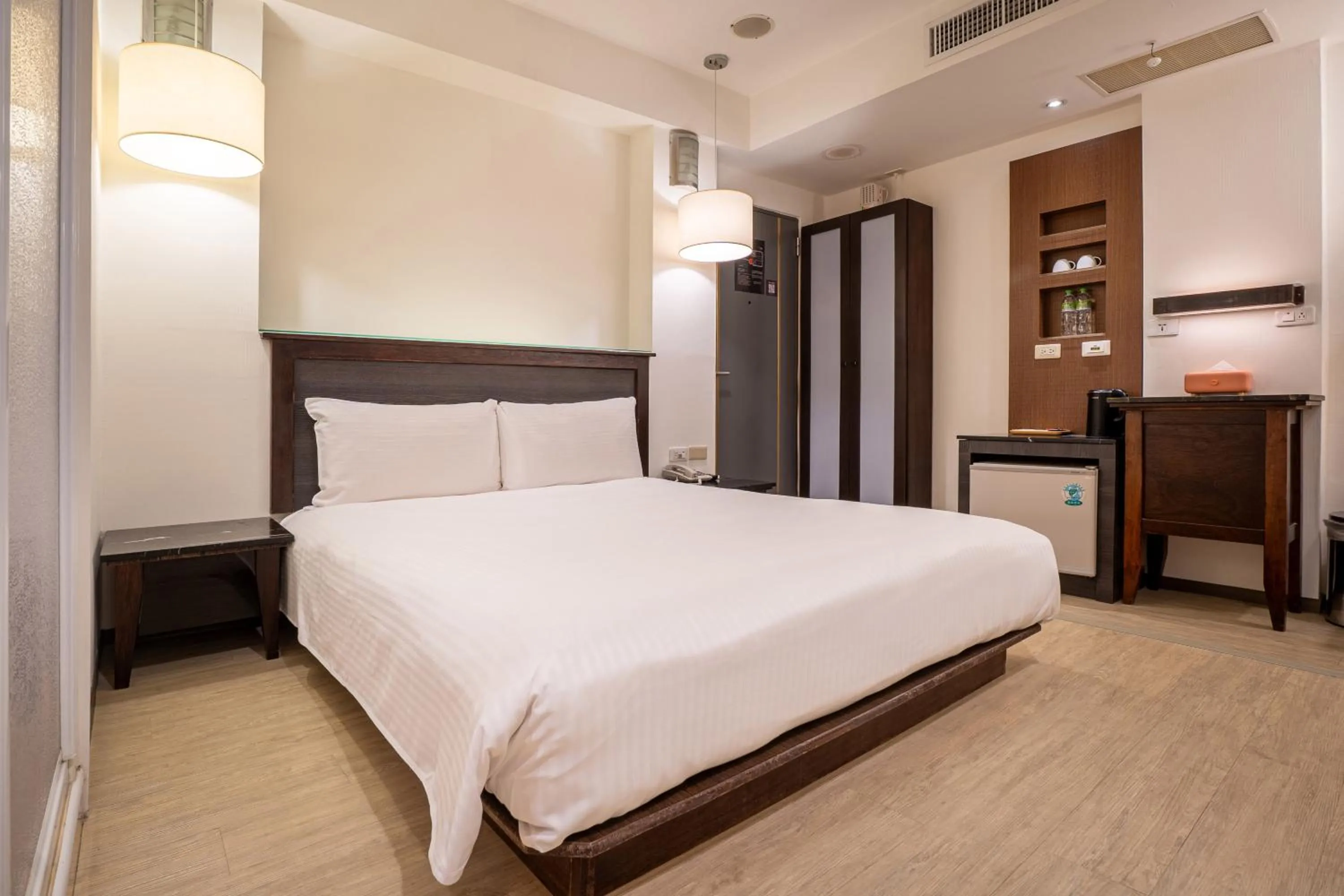 Photo of the whole room, Bed in Guide Hotel Kaohsiung Shinkuchan