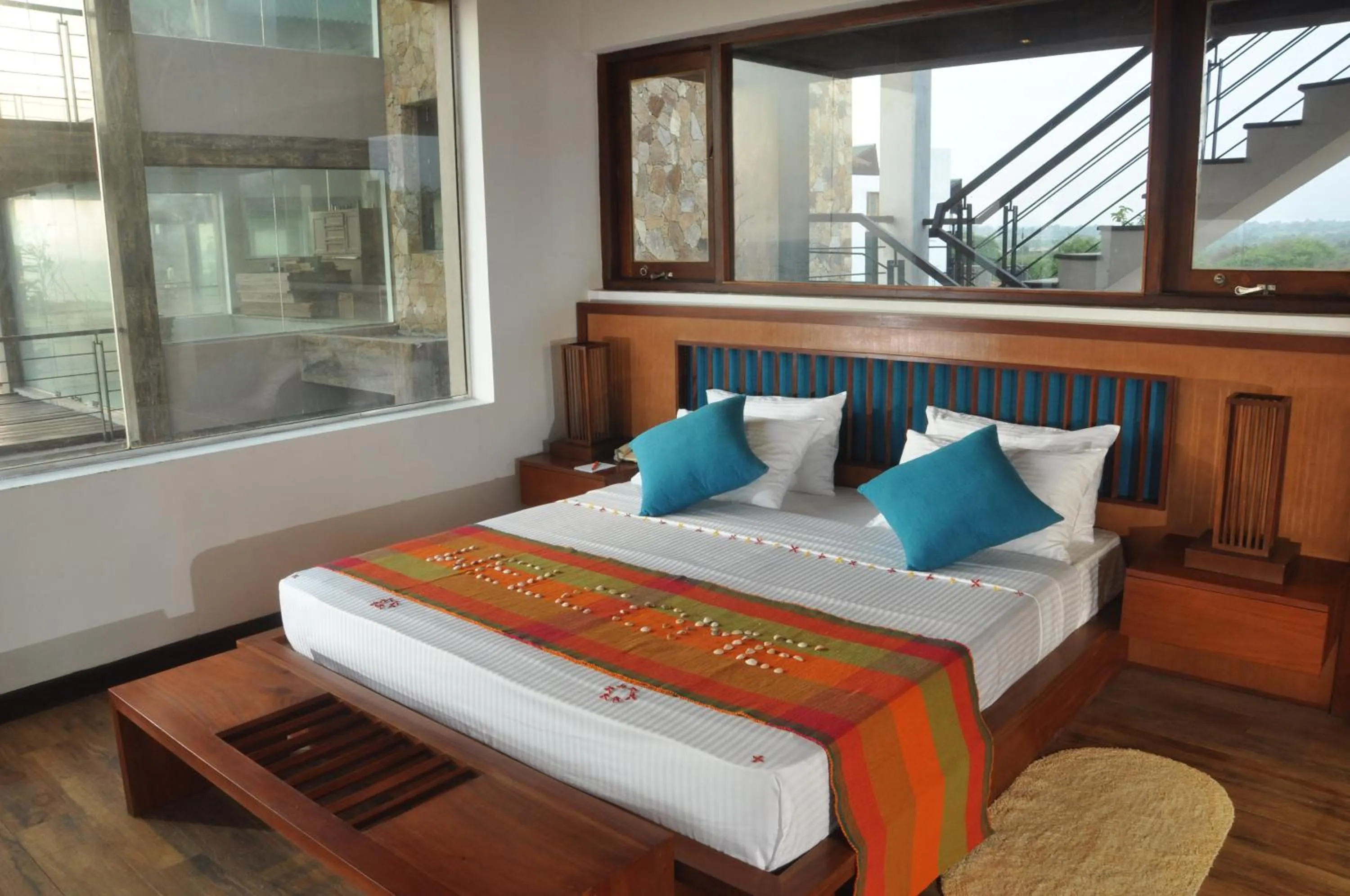 Bed in Laya Safari Resorts & Spa