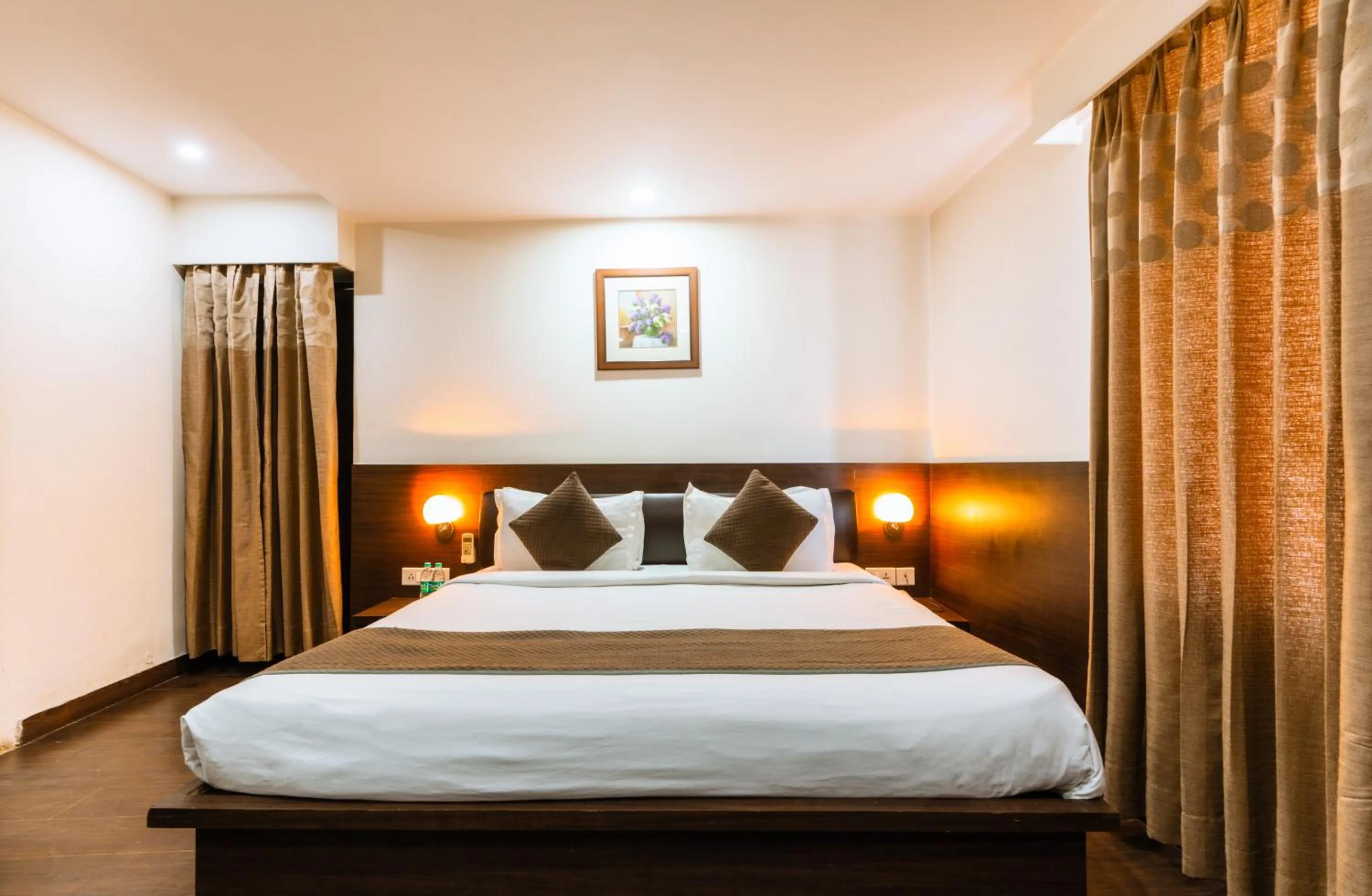 Bed in Hotel Krishna by KeyMagics