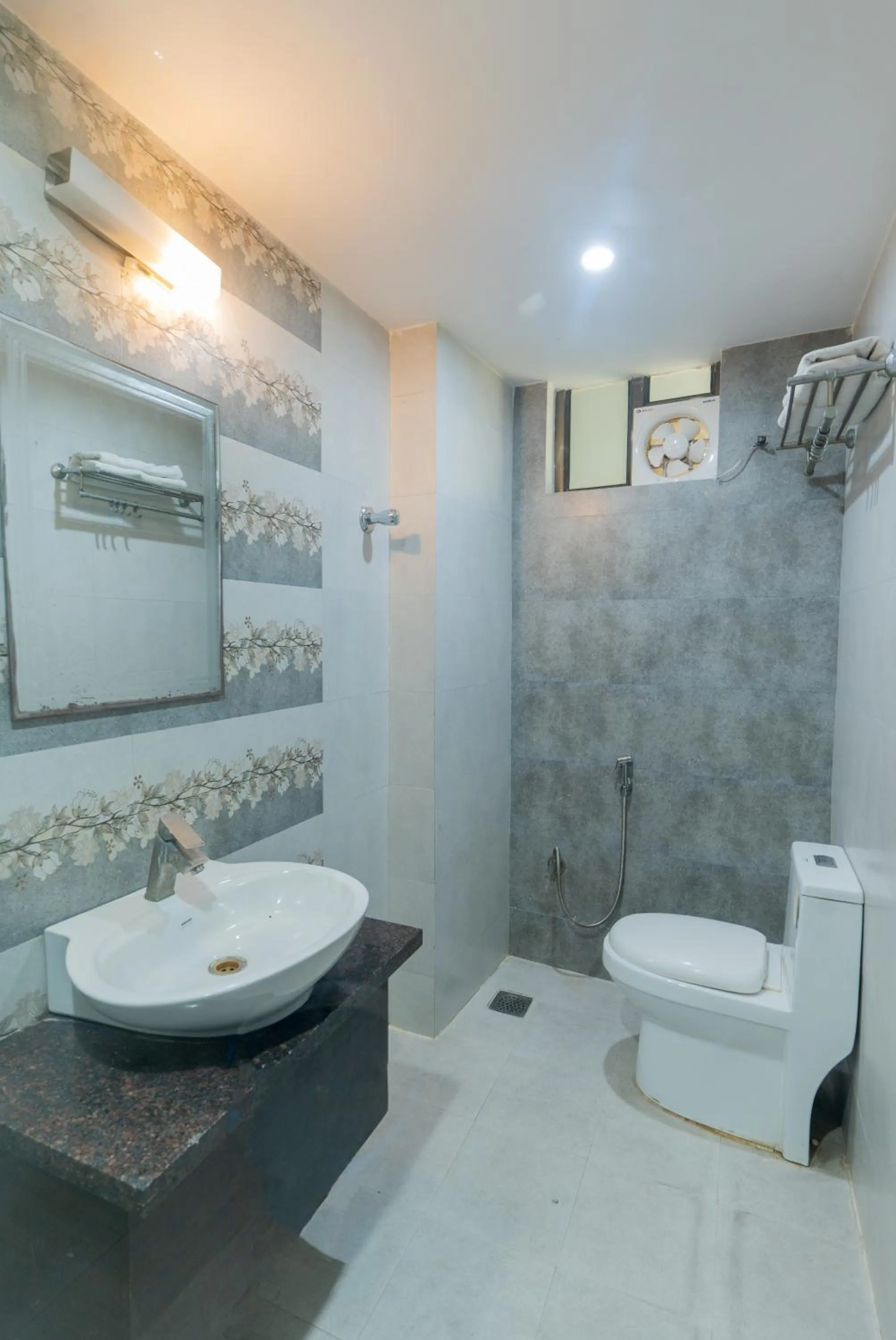 Toilet in Hotel Krishna by KeyMagics