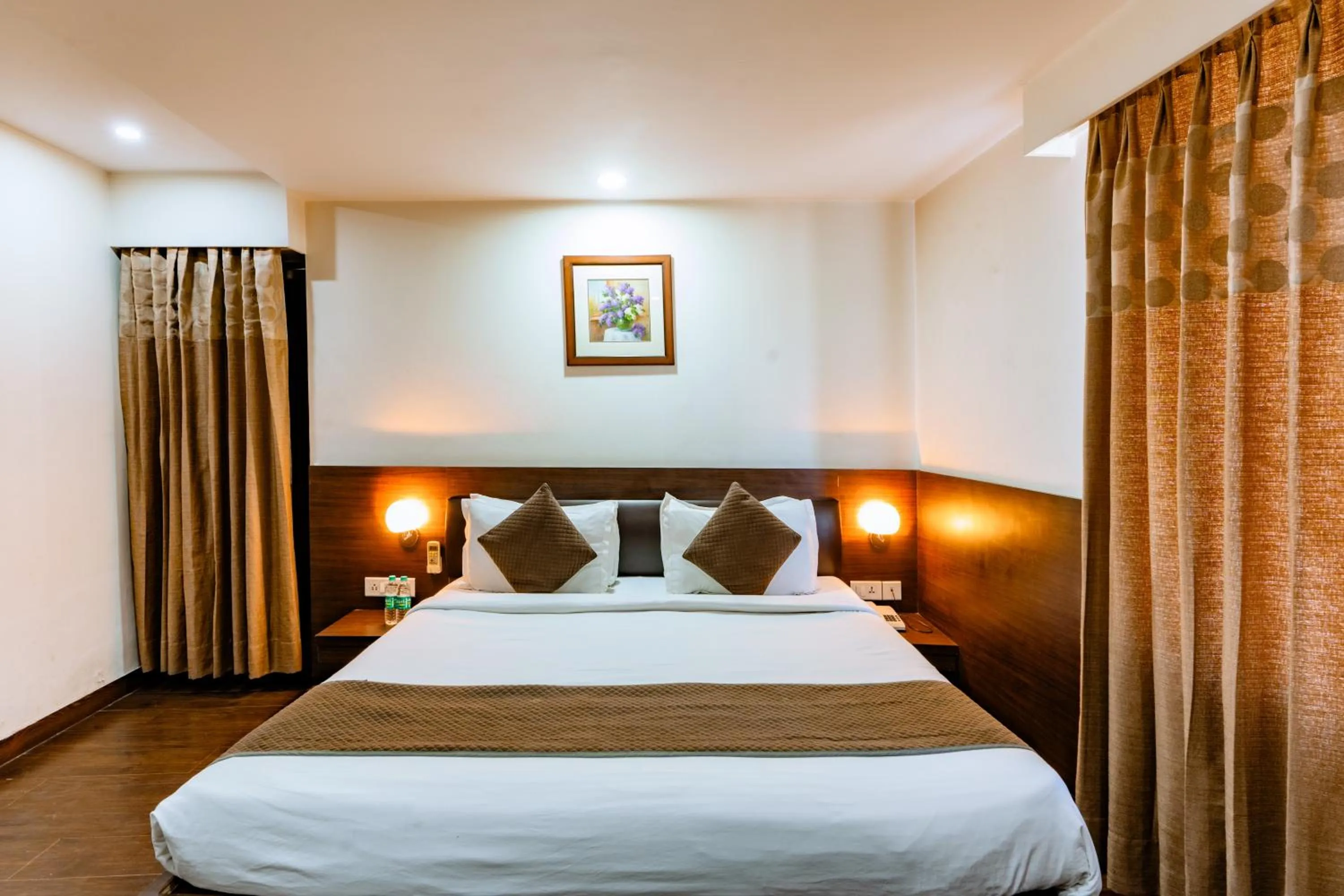 Bed in Hotel Krishna by KeyMagics