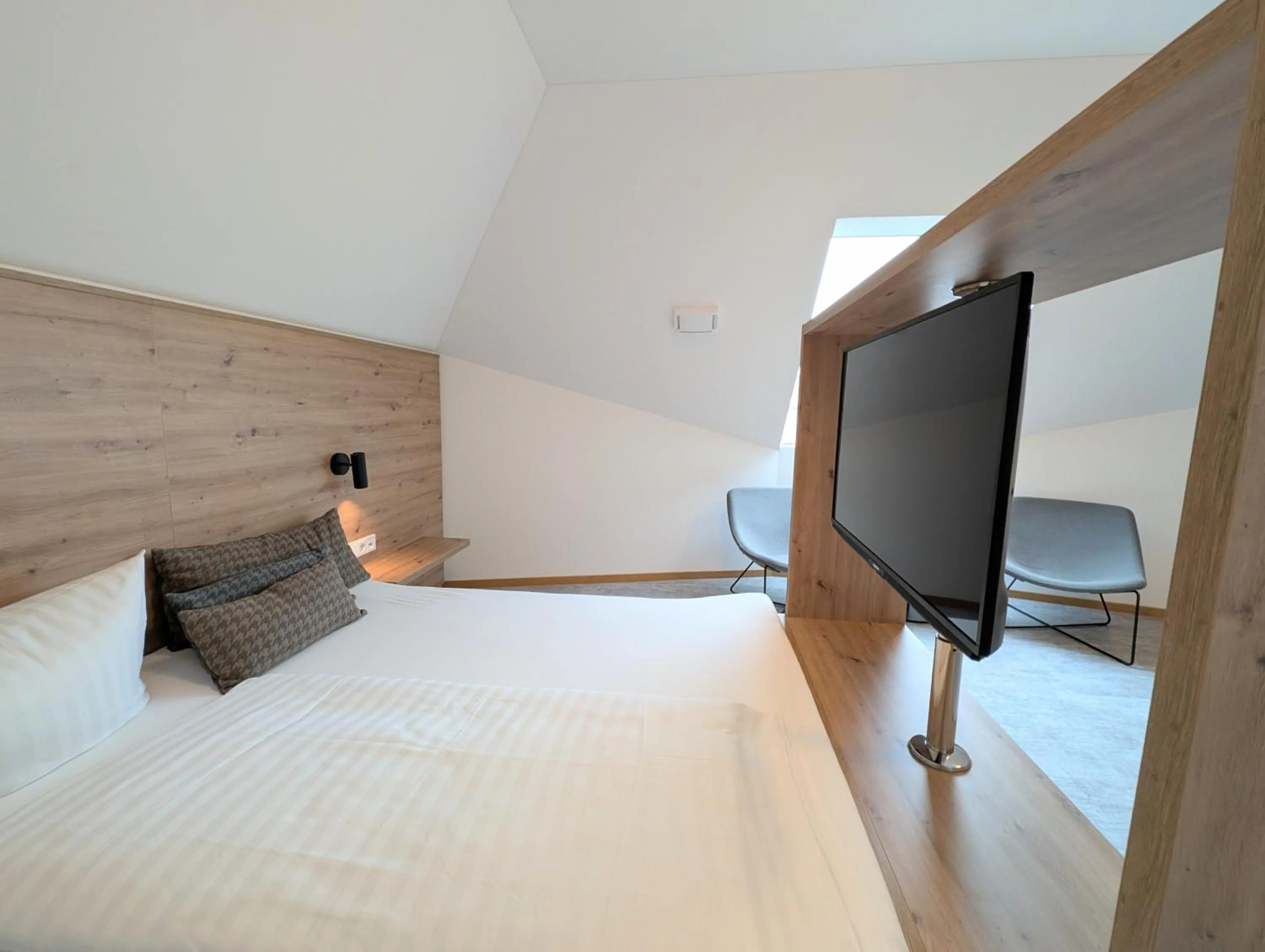 Bed in Kolping-Hotel