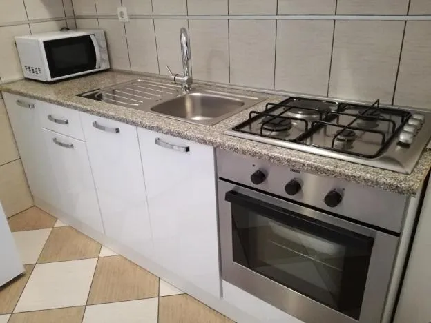 Kitchen or kitchenette in Apartments Klanac