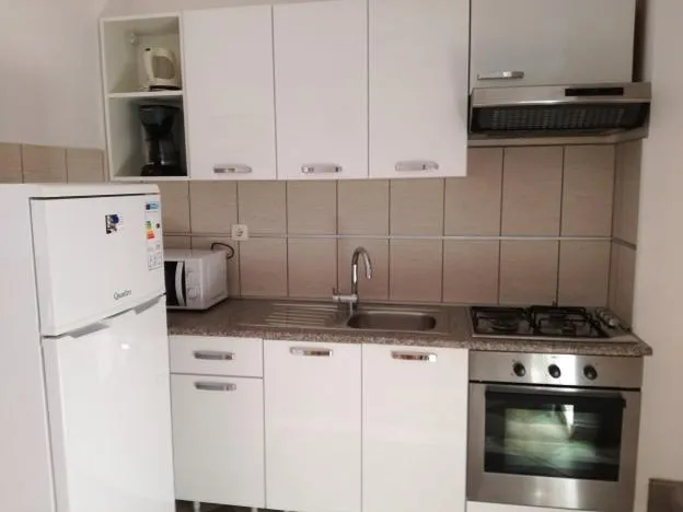 Kitchen or kitchenette in Apartments Klanac