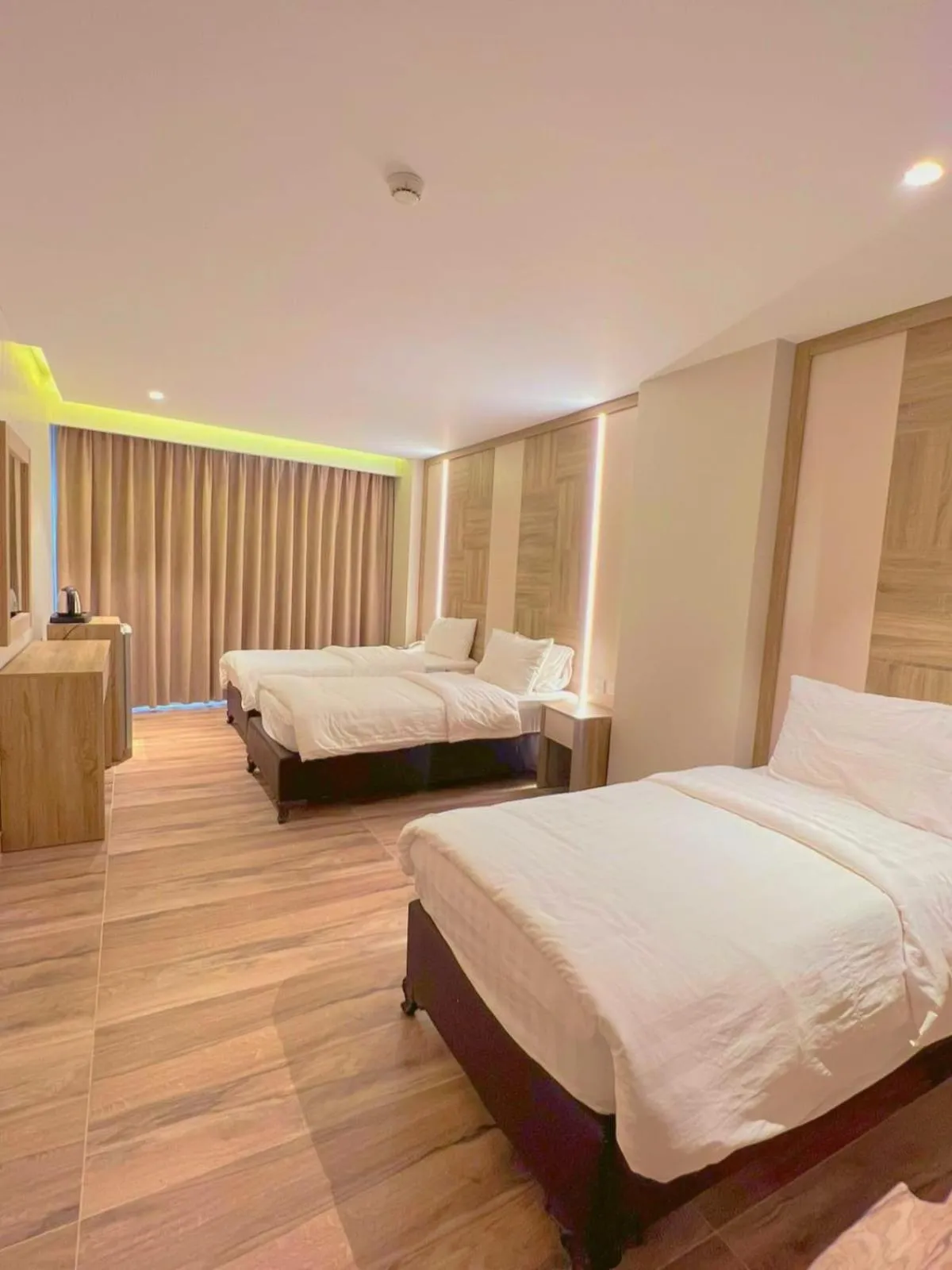 Bed in Mass Paradise Hotel