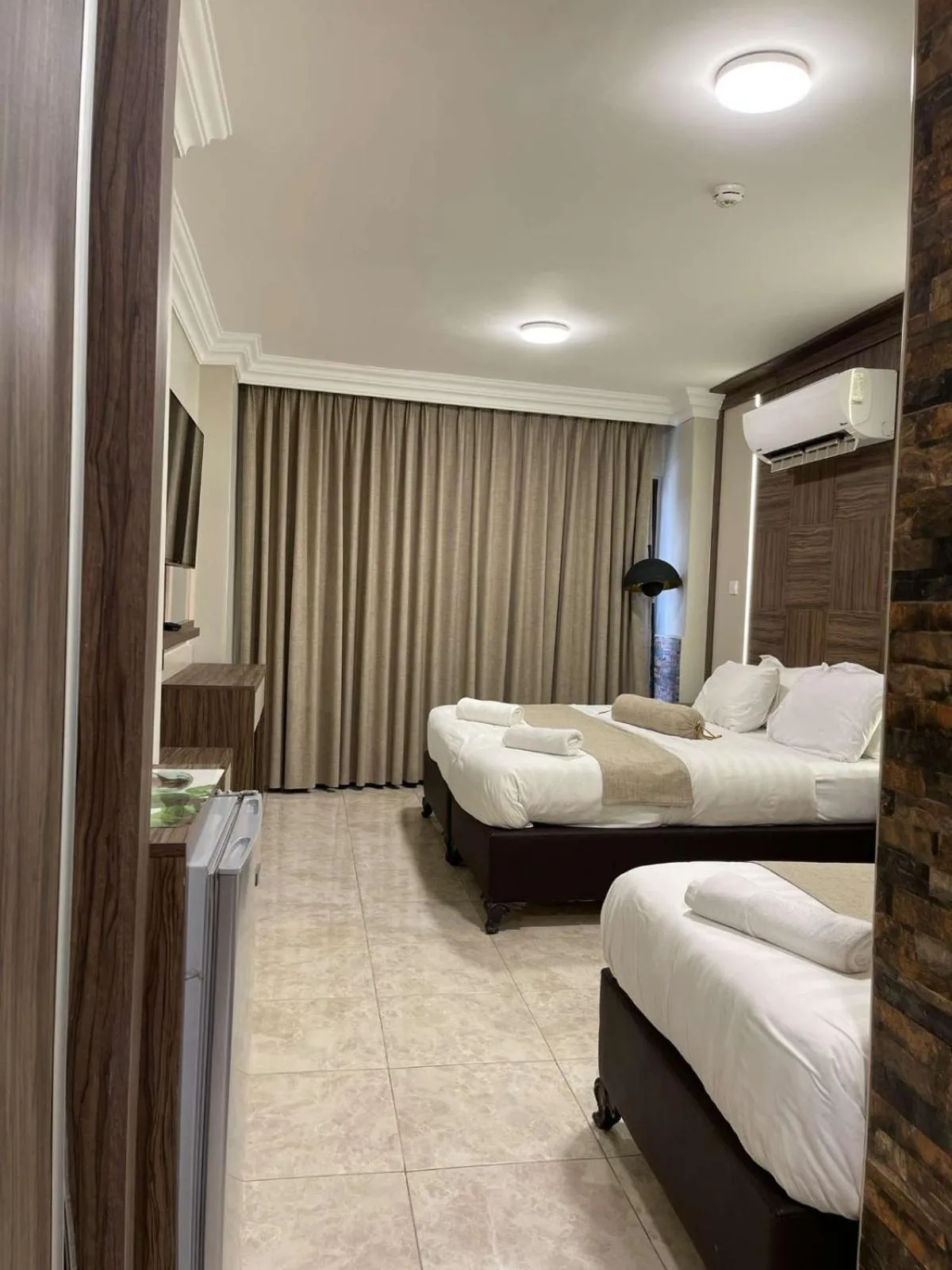 Bed in Mass Paradise Hotel