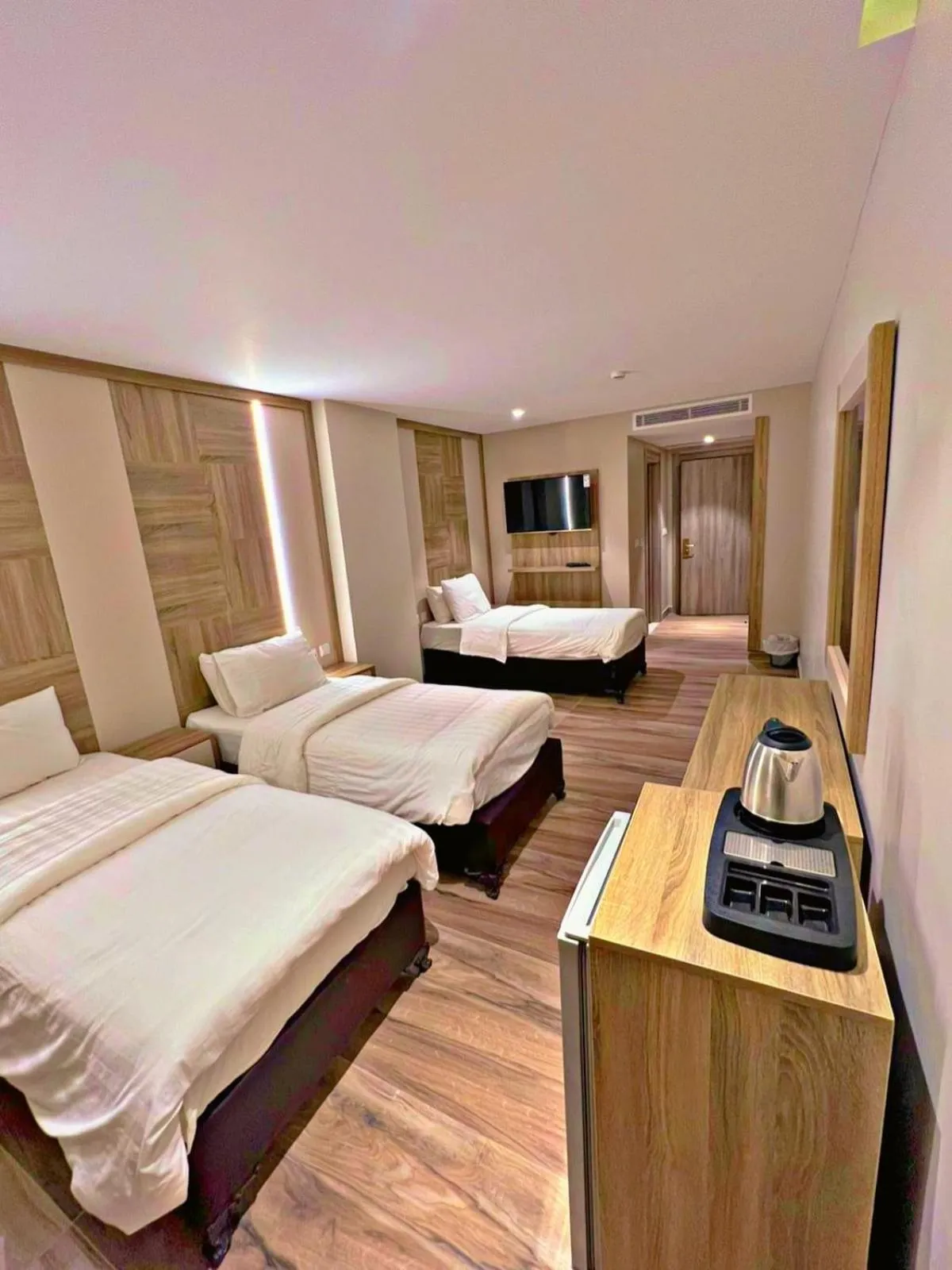 Bed in Mass Paradise Hotel