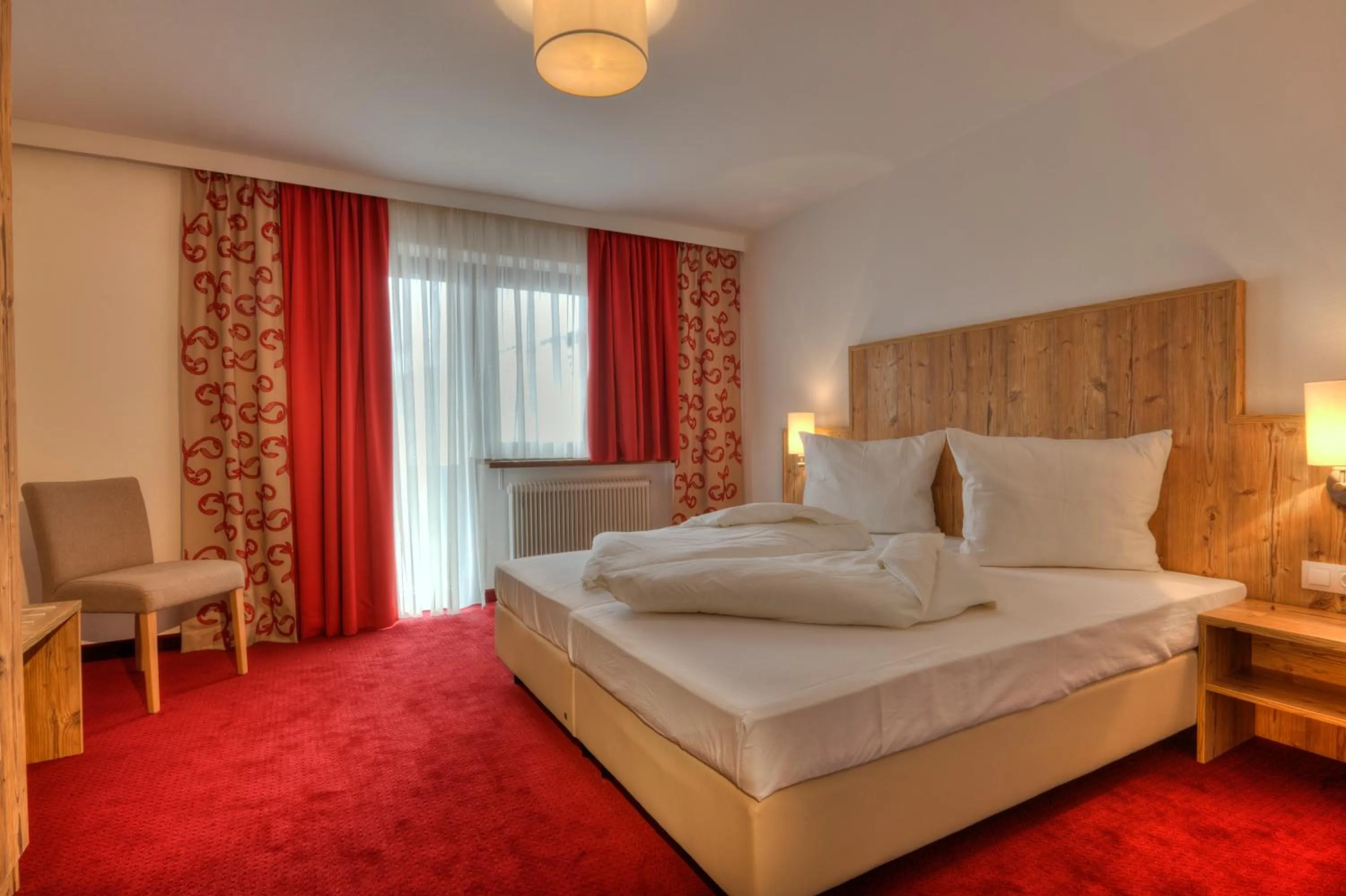 Bed in Hotel Kögele bei Innsbruck Axamer Lizum