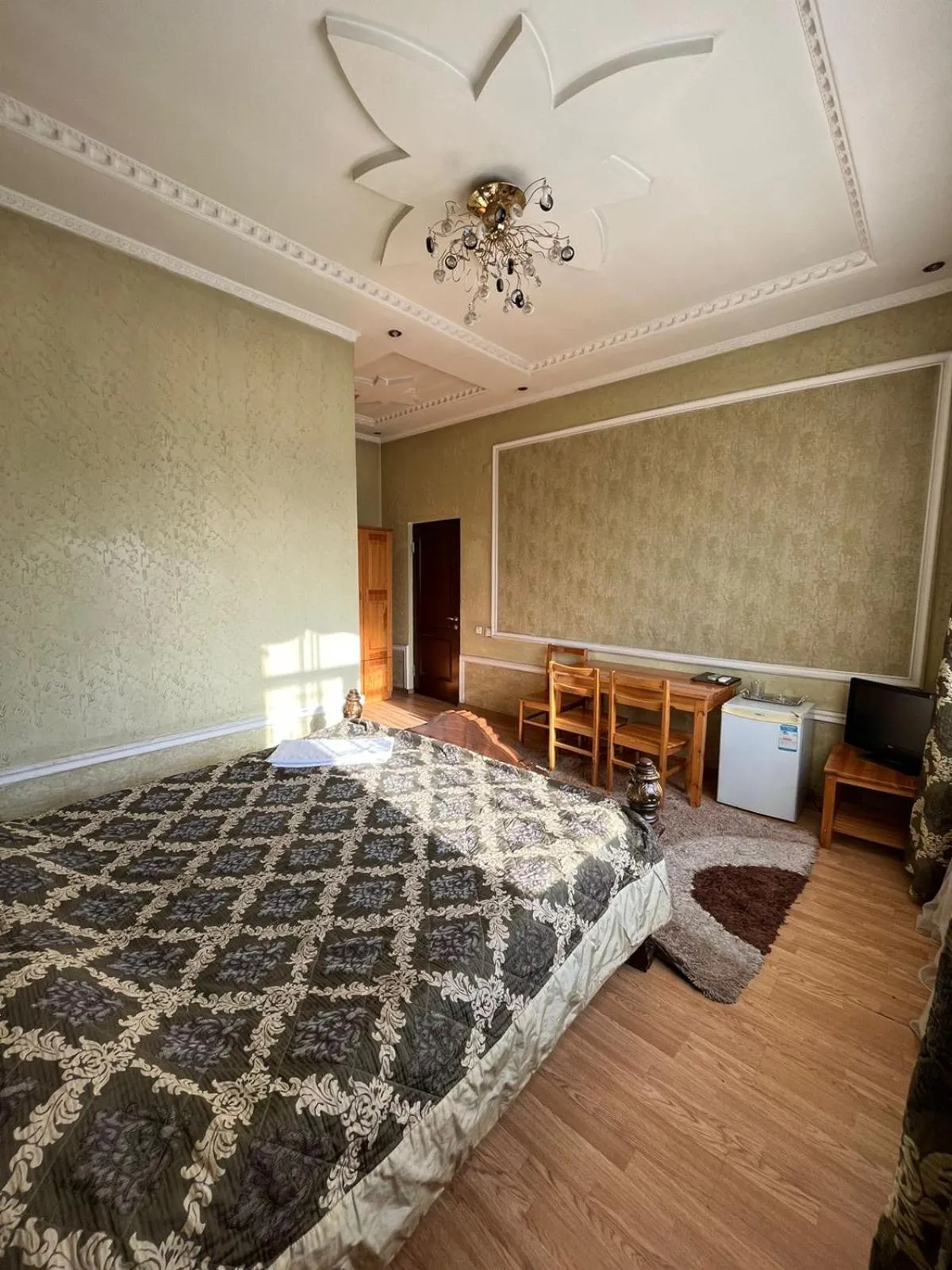 Photo of the whole room, Bed in Akzhol Hotel Almaty