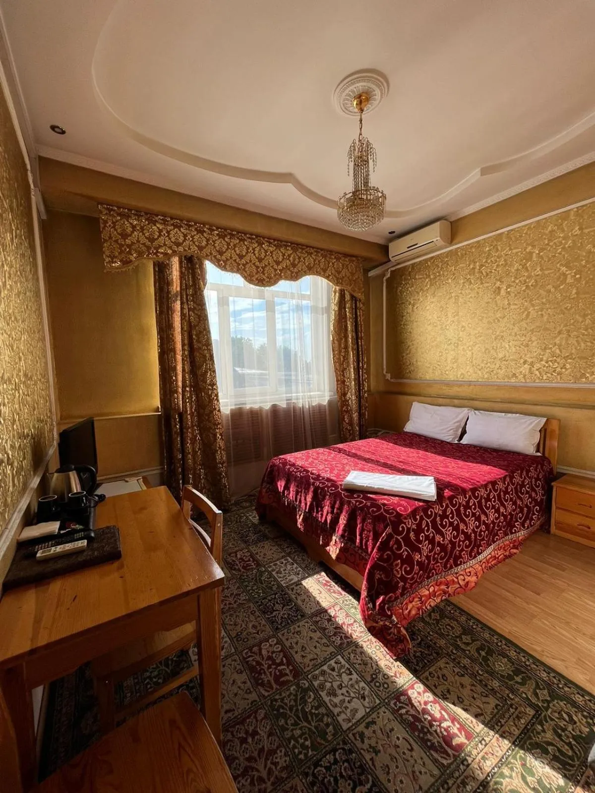 Photo of the whole room, Bed in Akzhol Hotel Almaty