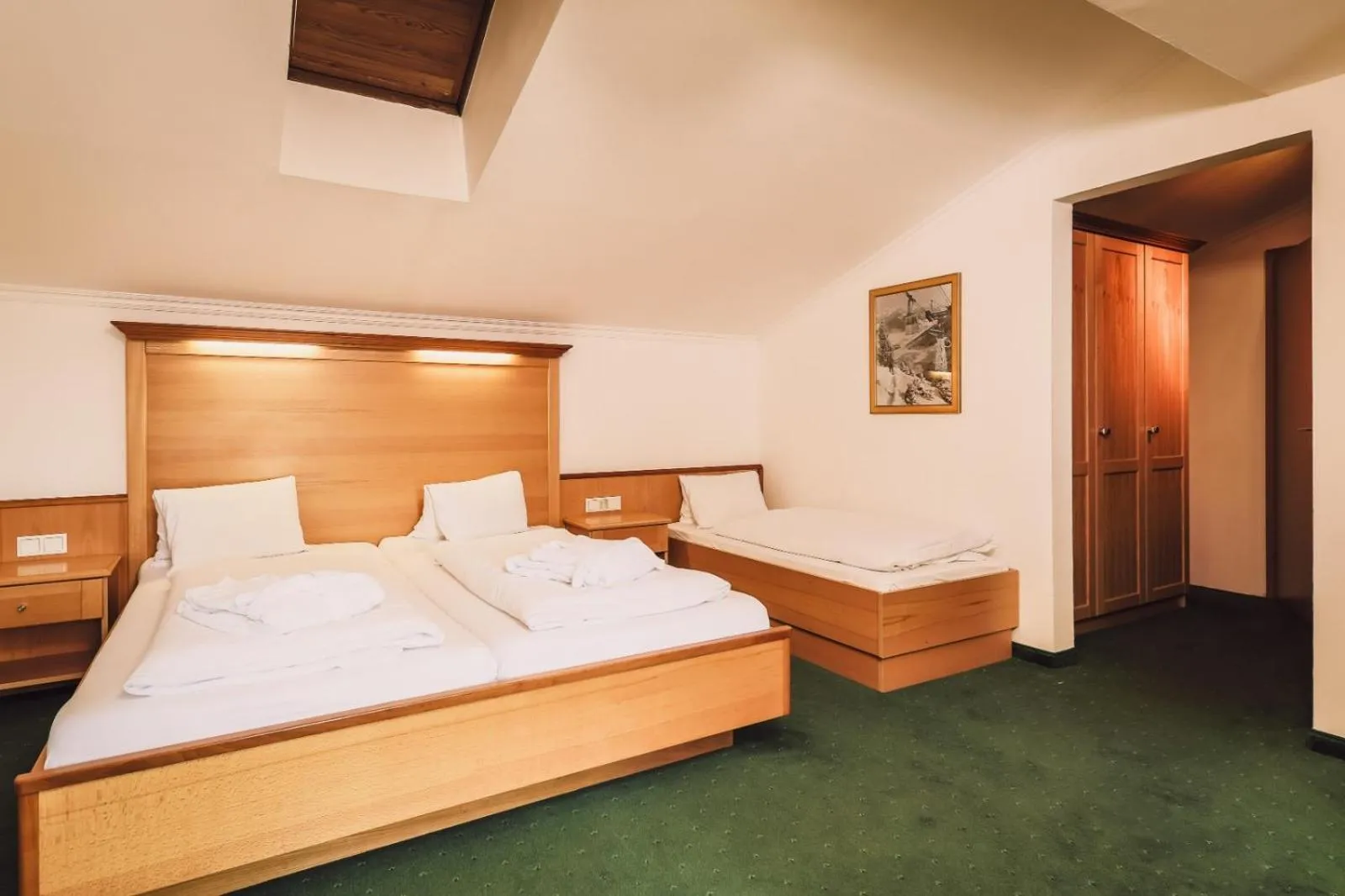 Photo of the whole room, Bed in Hotel Martini Kaprun inkluding breakfast & free parking