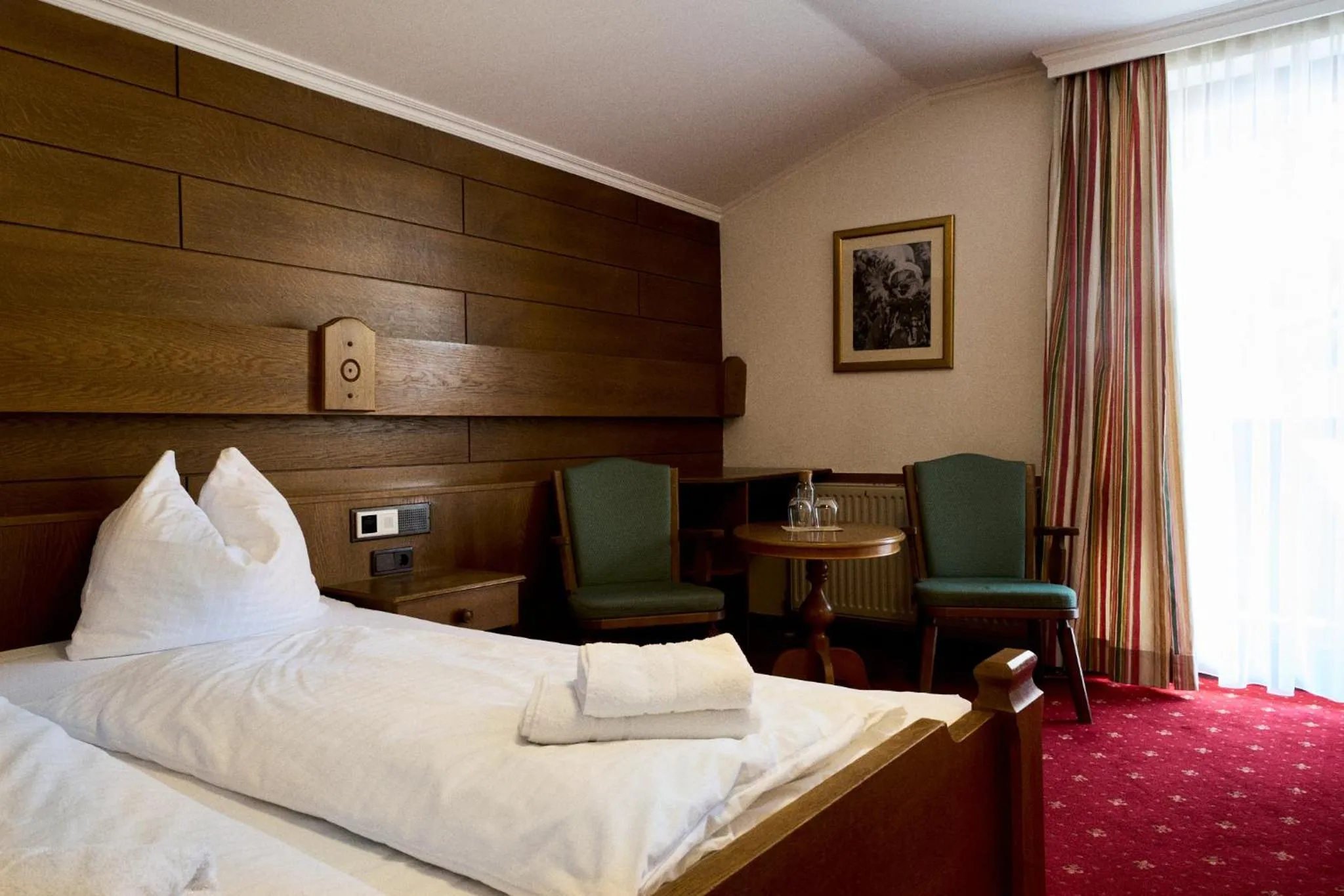Bed in Hotel Martini Kaprun inkluding breakfast & free parking