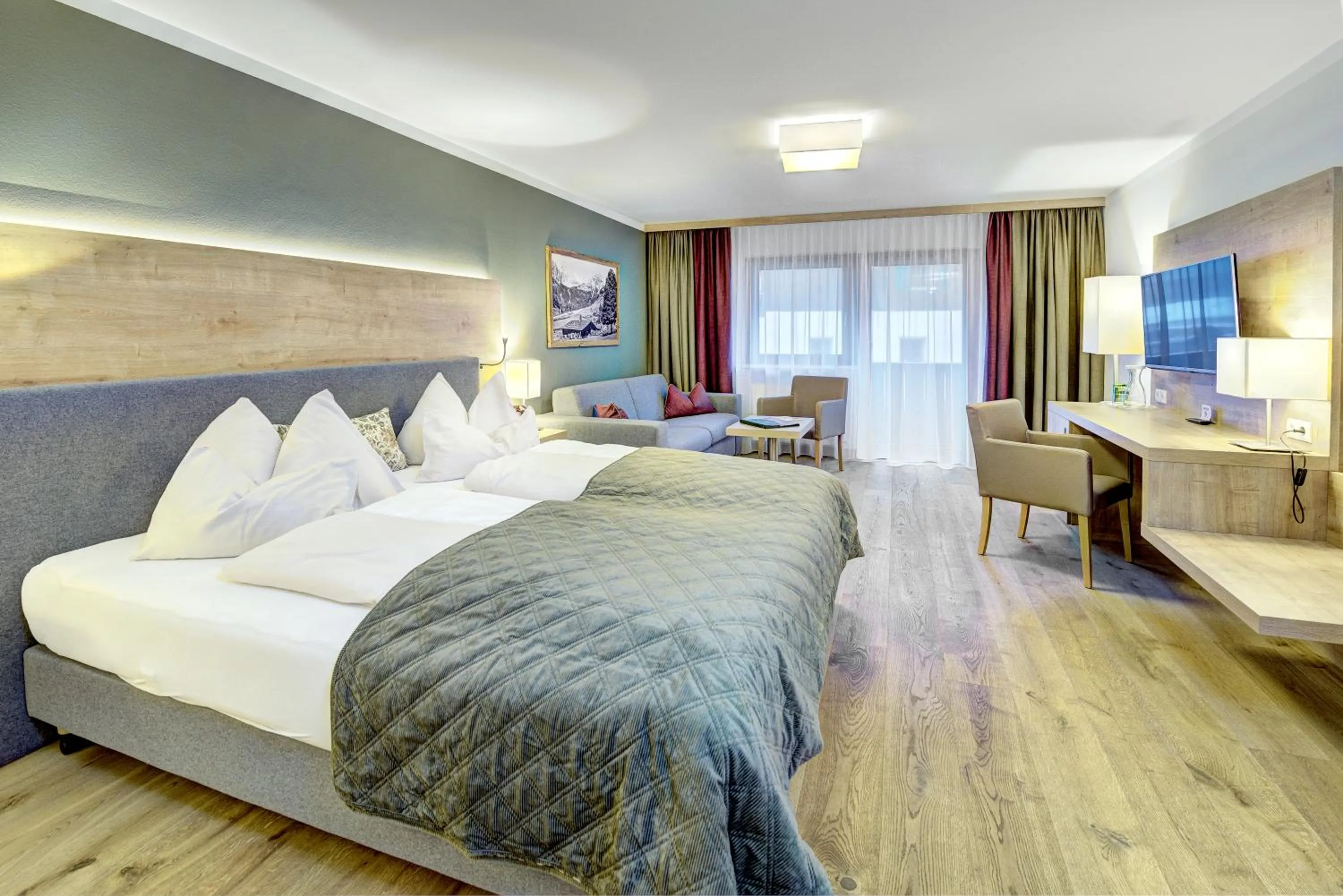 Seating area, Bed in Hotel Unterhof