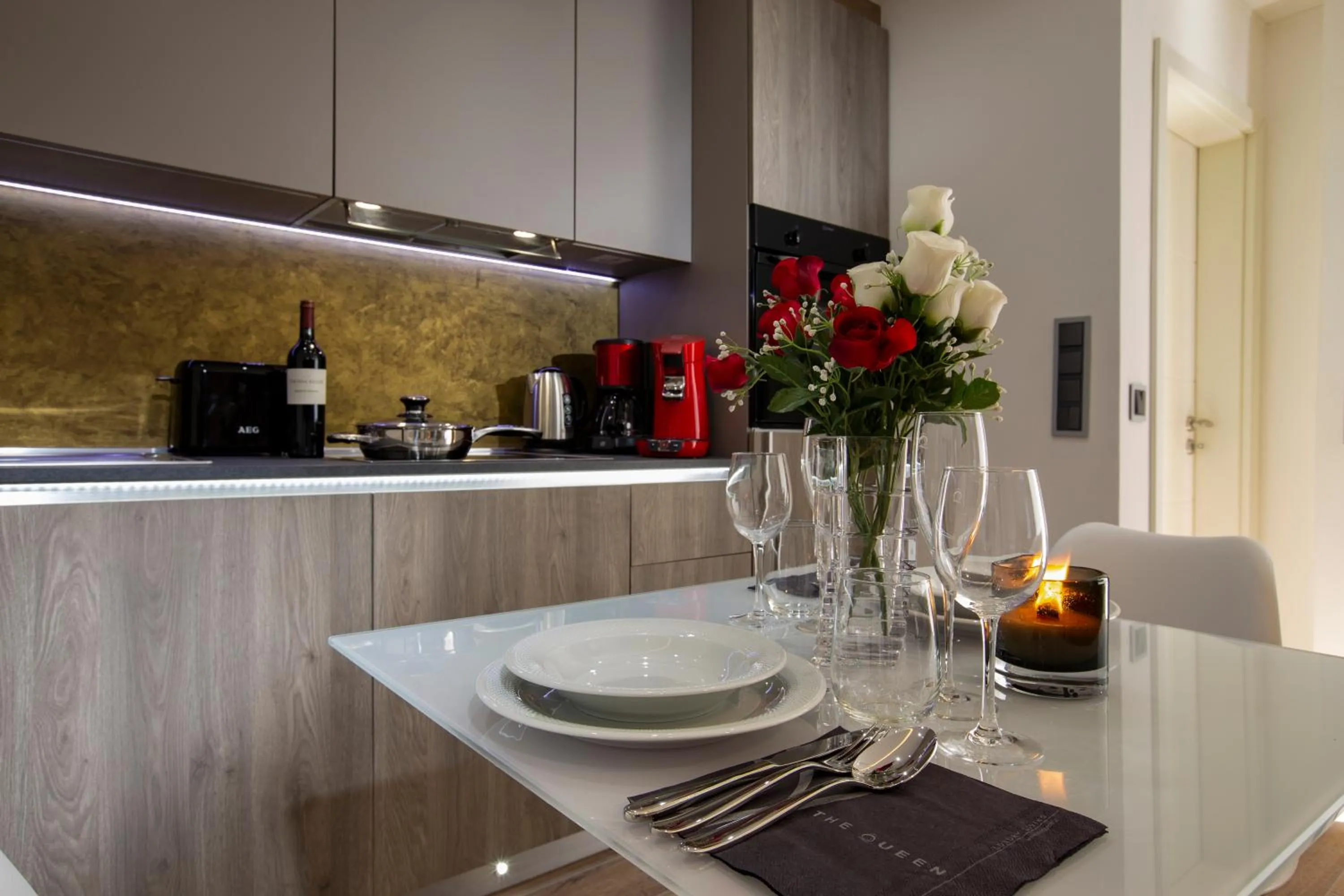 Kitchen or kitchenette in The Queen Luxury Apartments - Villa Carlotta