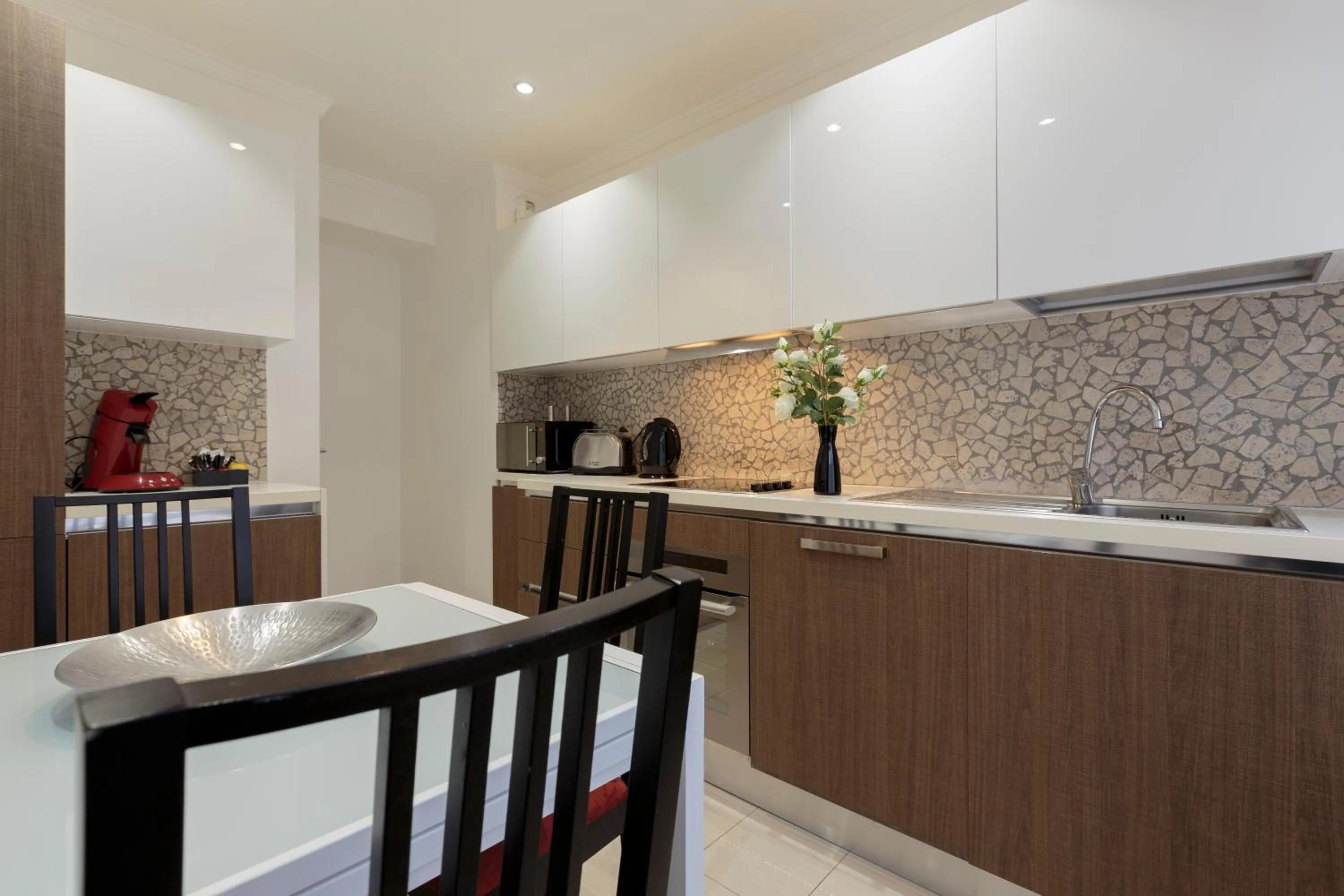 Kitchen or kitchenette in The Queen Luxury Apartments - Villa Carlotta