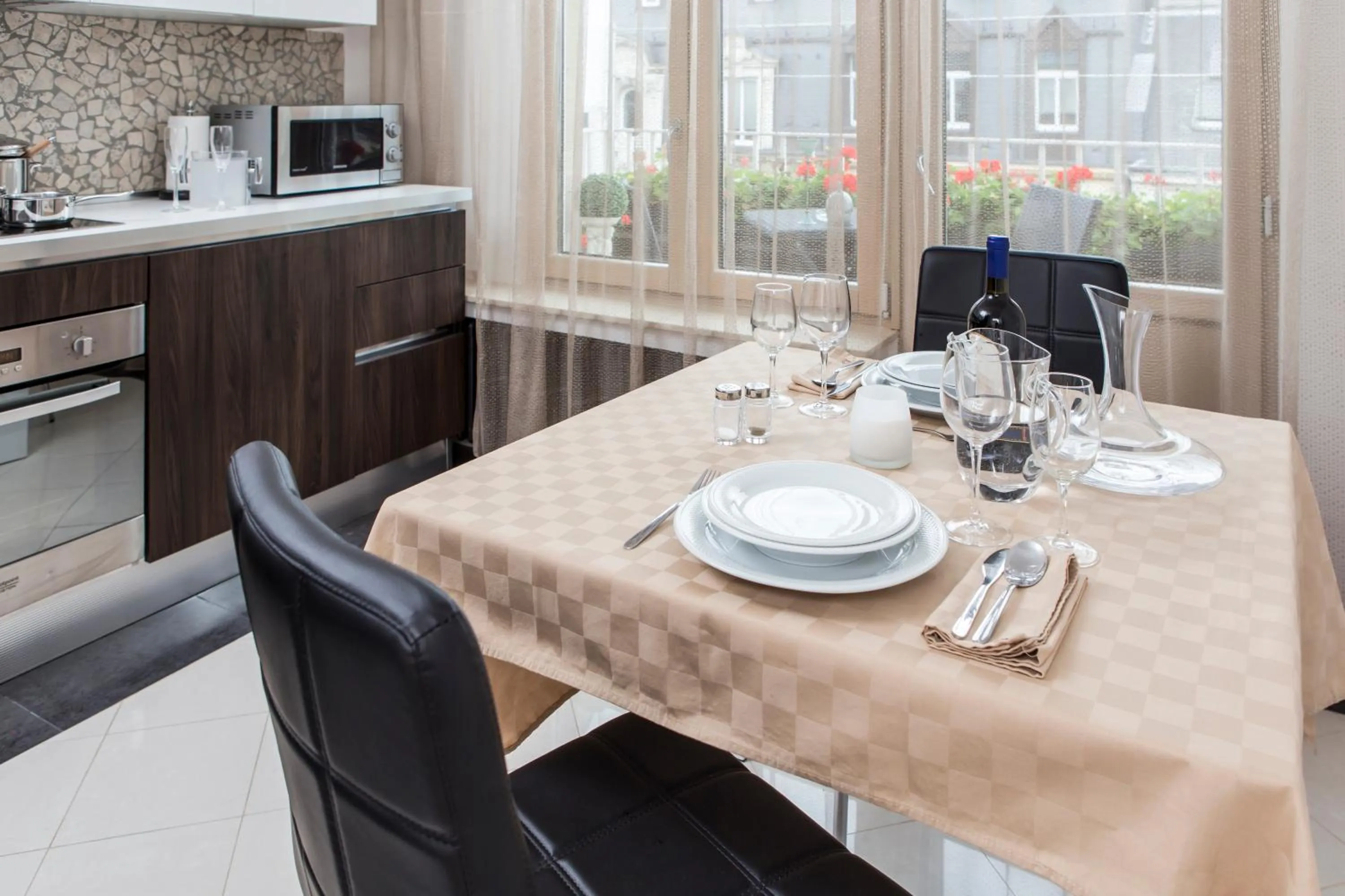 Kitchen or kitchenette in The Queen Luxury Apartments - Villa Carlotta